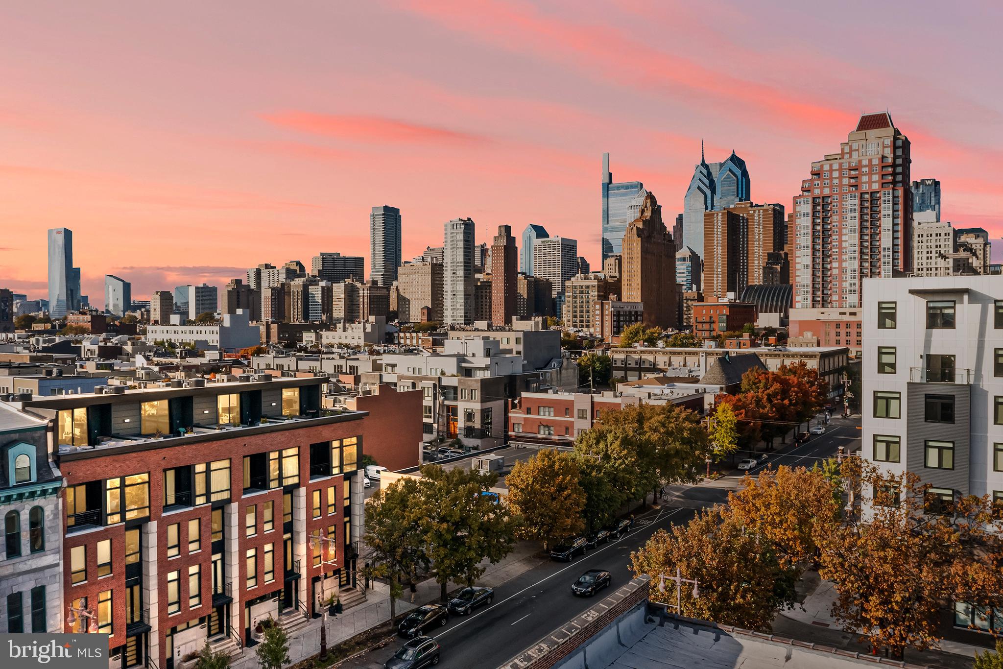 Contemporary masterpiece in the heart of Center City, Philadelphia - designed to cater to your every need and indulge your senses. This fully furnished 20-ft-wide home, with FOUR CAR PARKING offers a blend of contemporary design and elevated luxury that's truly unparalleled.

Embrace the outdoors with space that seamlessly integrates the outdoors with the indoor living spaces across multiple levels. The roof deck with its 20x20-foot pilot house provides striking views of the vibrant city skyline from your private hot tub, lounge, or dining spaces.

Designed with a mindset of abundance, the living spaces are expansive, generous, and feature floor-to-ceiling windows, with incredible natural light. The positioning of this home as the corner property, affords light on three sides and unobstructed views.

The attention to detail is evident in the continuous custom metal rail and glass-lined pinewood floating staircases, 4-zone heating/cooling system, and 8-foot tall wood doors. Large-format tile with radiant heat is both durable and sleek. The luxurious appointments continue with indoor and outdoor soaking tubs, Wolf/SubZero appliance package, and ensuite bathrooms with every bedroom. Enjoy luxe bookmatched marble, a gas fireplace, waterfall quartz countertops, and dramatic, designer lighting that adds elegance to every room.

The entire fourth level is dedicated to the owner's sanctuary. With 10-foot ceilings, a terrace, and panoramic city views, it's a retreat like no other. Two custom walk-in closets provide ample storage, and the luxe bathroom is a work of art with a dual shower, freestanding soaking tub, and double vanity.

This home is equipped with custom home automation of lighting, sound, and temperature, allowing you to control and customize every aspect of your living environment with ease. The 6-stop elevator that reaches all levels, from the basement to the roof deck, making every level accessible and effortless.

The ground level offers versatility with sliding glass walls, creating space for your home office, library, fitness room, or a tranquil zen retreat.

Both location and convenience, with a Walk Score of 97, Transit Score of 100, and Bike Score of 88, this home is ideally situated for city living and comes with 7 years remaining on a 10-year tax abatement.

Don't miss your chance to own this meticulously designed and crafted masterpiece by respected local builder G&M Efestos and Gnome Architects. Your urban oasis awaits, so make this mood-boosting home your own. Contact us today to schedule your exclusive viewing.