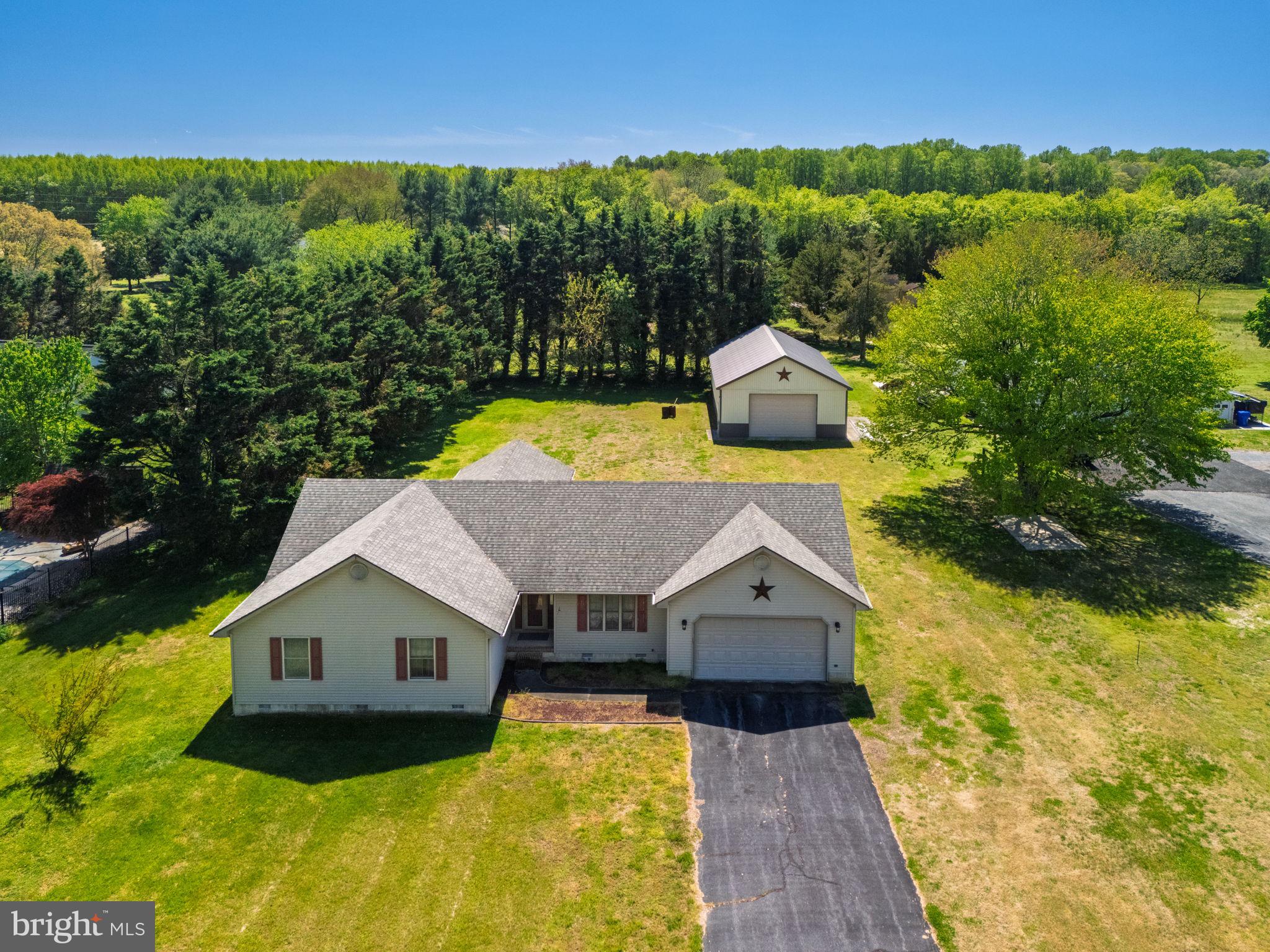 Charming custom built home full of character, set on 1 acre with NO HOA and featuring an incredible 30' x 58' pole barn that is a rare find in this area. With 12' walls and extensive second-floor storage, the barn offers exceptional space for equipment, vehicles, hobbies, a workshop, or all your extra storage needs. Next to the barn, a concrete RV pad with 30-amp hookup adds even more versatility.

The home itself has seen several important updates, including a roof replaced roughly 5 years ago, an HVAC system only 1.5 years old. The property is serviced by well and septic with a new jet pump and bladder tank. The home offers a warm and inviting feel, highlighted by a spacious 16x20 sunroom with a gas fireplace that is perfect for year-round enjoyment.

Conveniently located near downtown Milton with easy access to Lewes, Broadkill Beach, and the Delaware beaches, this property offers the charm of country living with the benefit of being close to everything. A unique opportunity with character, space, and a hard-to-find barn setup that is rarely available in this area.

Home is being sold as is.
