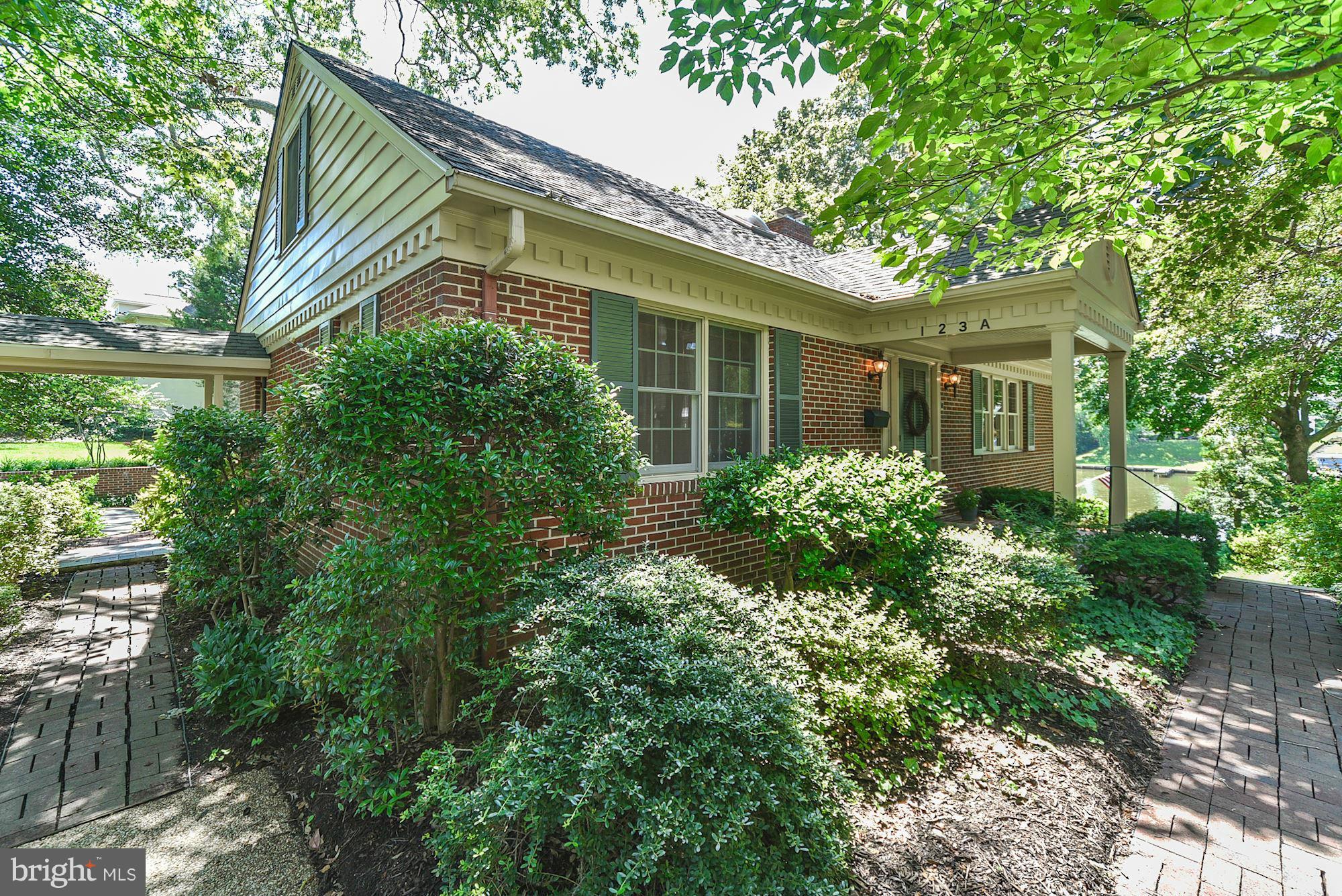Lovingly Maintained Spa Creek Waterfront | All brick home | Traditional floor plan - 4 Bedrooms, 1 BR on main level, 1 BR on walkout level w/guest suite potential | Filled with charm | Sunny screened in porch off kitchen w/great Spa Creek views | 75' water frontage | private 60 ft. pier w/10,000 lb. boat lift | Walk to town & Maryland Hall venues.