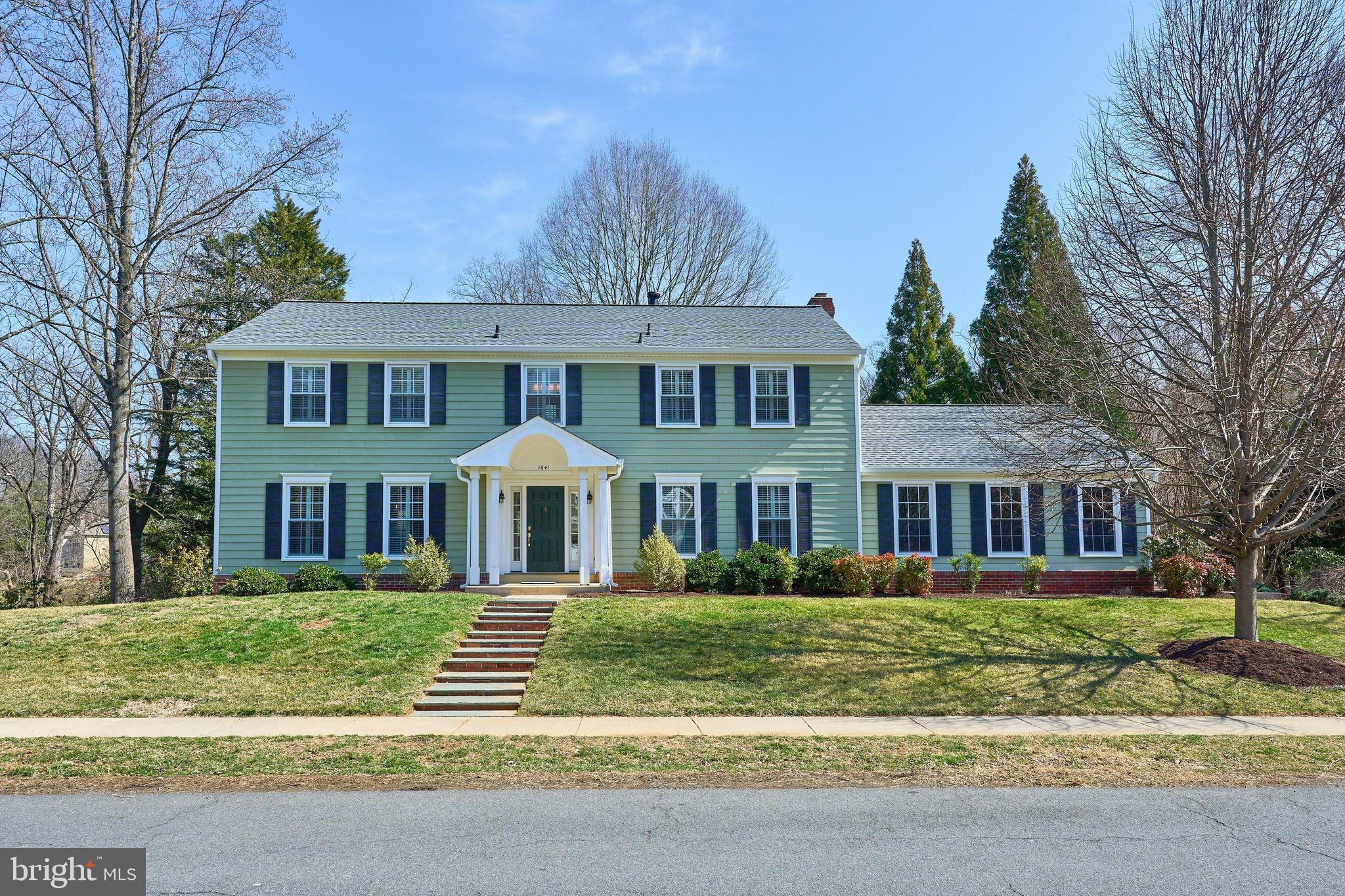 🏠 Situated in the Chesterbrook Mews community,  this expansive six bedroom colonial on 0.36 acre is what you have been waiting for.  

Front entry through the lovely foyer greets you with the curved stair case and beautiful moldings that serves as the main artery to the home. To the right is the large formal living room with crown molding and plantation shutters- the room could be large enough for a grand piano & sitting area. To the left is the main level powder room and the home office with built in book shelves and privacy doors. Straight back from the foyer, the heart of the home is the renovated kitchen with custom cabinetry, center island. GE Monogram dual wall ovens with warming drawer, in addition to the full size dishwasher there is a 2nd dishwasher drawer by the  2nd sink and beverage center area, that also has SubZero beverage refrigerator in addition to the full size refrigerator.   The kitchen was expanded with a bump out so that in addition to the island seating there is also breakfast table space to make it a doubly true eat in kitchen.

On one side of the kitchen,  is the large dining room that is the perfect space for a more formal meal, either hosting your favorite holiday meals or a regular Wednesday night dinner. 

From the other side of the kitchen along the back of the home, step down to the family room that is opened up from the kitchen. There is a masonry fireplace that has a gas line installed to give the option for the type of use that you would like to have. Built in bookshelves around the fireplace accent the wall opposite the kitchen and gives the perfect space to relax or entertain.   Sliding doors of the back of the house from either the family room or the breakfast area not only allow access to the fantastic outdoor space, but also allows for sunlight to stream into the home for great natural lighting. 

Hidden off the back of the family room is the mud room/main level laundry room that has a large pantry/ storage closet, built in sink next to the stacked washer dryer and fantastic "Drop Zone" for bringing in things from the oversized side entry 2 car garage.  Most windows in the property have been replaced including the newer Marvin Windows & Doors along the kitchen, family room and mud room.

Upstairs boasts five bedrooms. The large primary bedroom has a large walk in closet. The primary bathroom was gutted and renovated in 2024 to include a glass enclosed shower with shower heads on either side. Dual sinks over vanity with abundant storage.   Four additional upstairs bedrooms that are spacious in their own right.

The walk out  lower level of the home has fantastic rec room that is a perfect over flow space for the family and or guests. The lower level legal bedroom has a large walk in closet.  Additionally there is a den that could be a craft room, play room,  or even more storage in addition to the utility room.  

The sale of the home includes the side yard out lot that gives an additional 3000+ sq ft to the already large property that backs to Little Pimmit Run of county land.   Off the entire back of the home is an extensive tiered deck and patio across that allows for outdoor cooking, relaxing, and enjoying nature while looking over the flat back yard.   Back and side yard are a perfect place for games or gardening.  Privacy landscaping along the edges of the property makes you  enjoy the space with out looking at your neighbors.

Location is convenient with only 2 stoplights to DC, close to downtown Mclean and easy commute to Arlington, Tysons & beyond!

This is the home you have been waiting for.