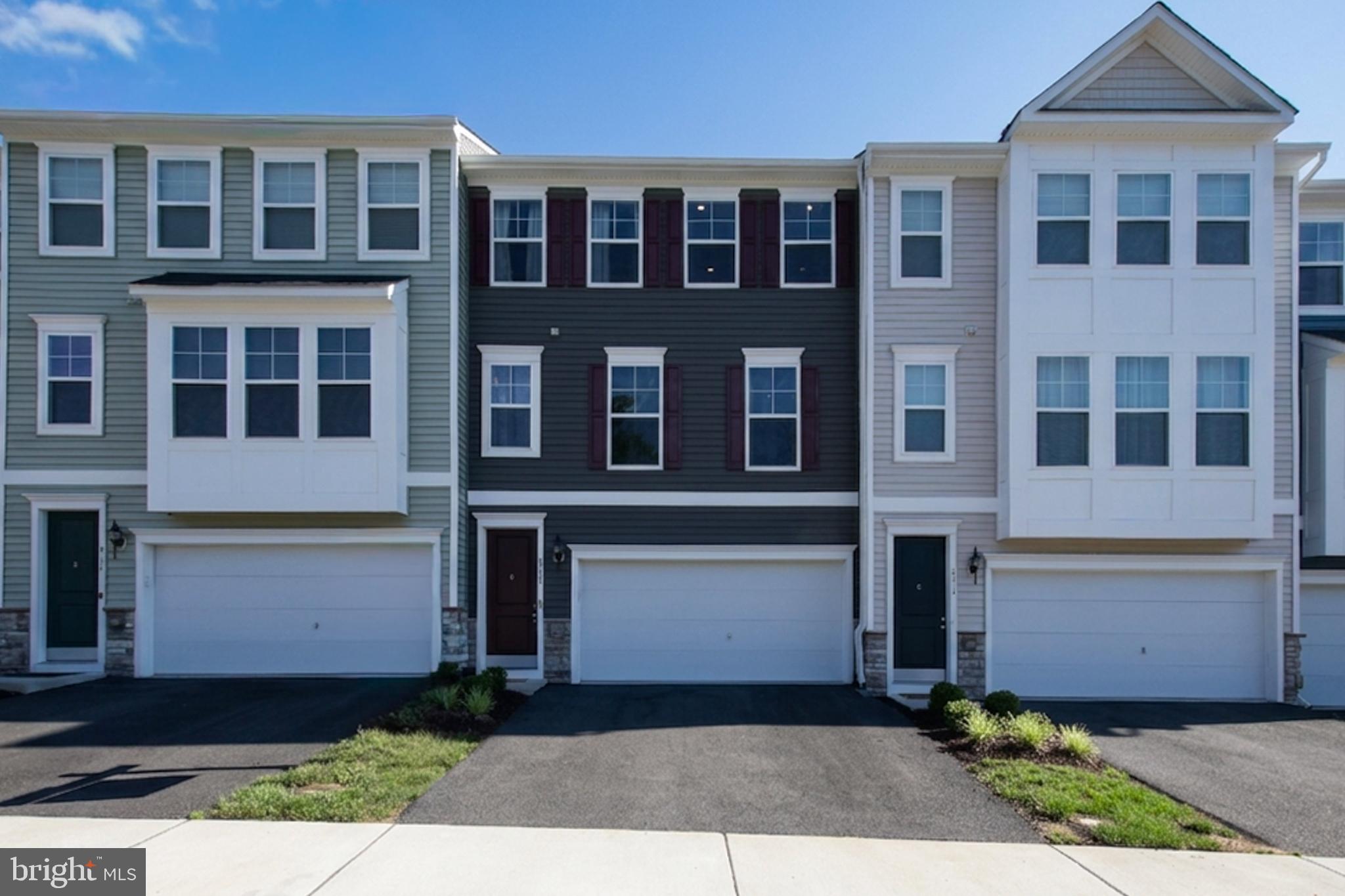 Open houses on Sat 6/20 from 9am-3pm & Sun 6/21 from 1pm-3pm. Negotiable but sellers would prefer a rent back through end of July or August.

Welcome home to this spacious and beautifully designed townhome offering comfort, style, and convenience in one ideal package. The fully finished lower-level rec room provides the perfect flex space for entertaining, a home office, or relaxing, with direct access to the backyard, 2-car garage, and private driveway, plus a convenient half bath.

Up the elegant oak staircase, the main level opens into a bright and airy great room, seamlessly flowing into the dining area and gourmet kitchen, perfect for hosting or everyday living. The kitchen is a standout, featuring a large center island, granite countertops, double wall ovens, and a spacious pantry.

The upper level is your private retreat, highlighted by a spacious Owner’s Suite with a walk-in closet and spa-like bath complete with dual vanities and a linen closet. Two additional generously sized bedrooms, an upper-level laundry room, and a full hall bath complete the space. All bedrooms have 3 NEW CEILING FANS!

Ideally situated for commuters, this home offers quick access to I-95 and Route 1, and is just 4.5 miles from the Virginia Railway Express station. Enjoy being minutes from Marine Corps Base Quantico, the National Museum of the Marine Corps, Prince William Forest Park, scenic trails, shopping at Potomac Mills, great dining, and the Medal of Honor Golf Course. This location truly offers the best of convenience, recreation, and lifestyle.
