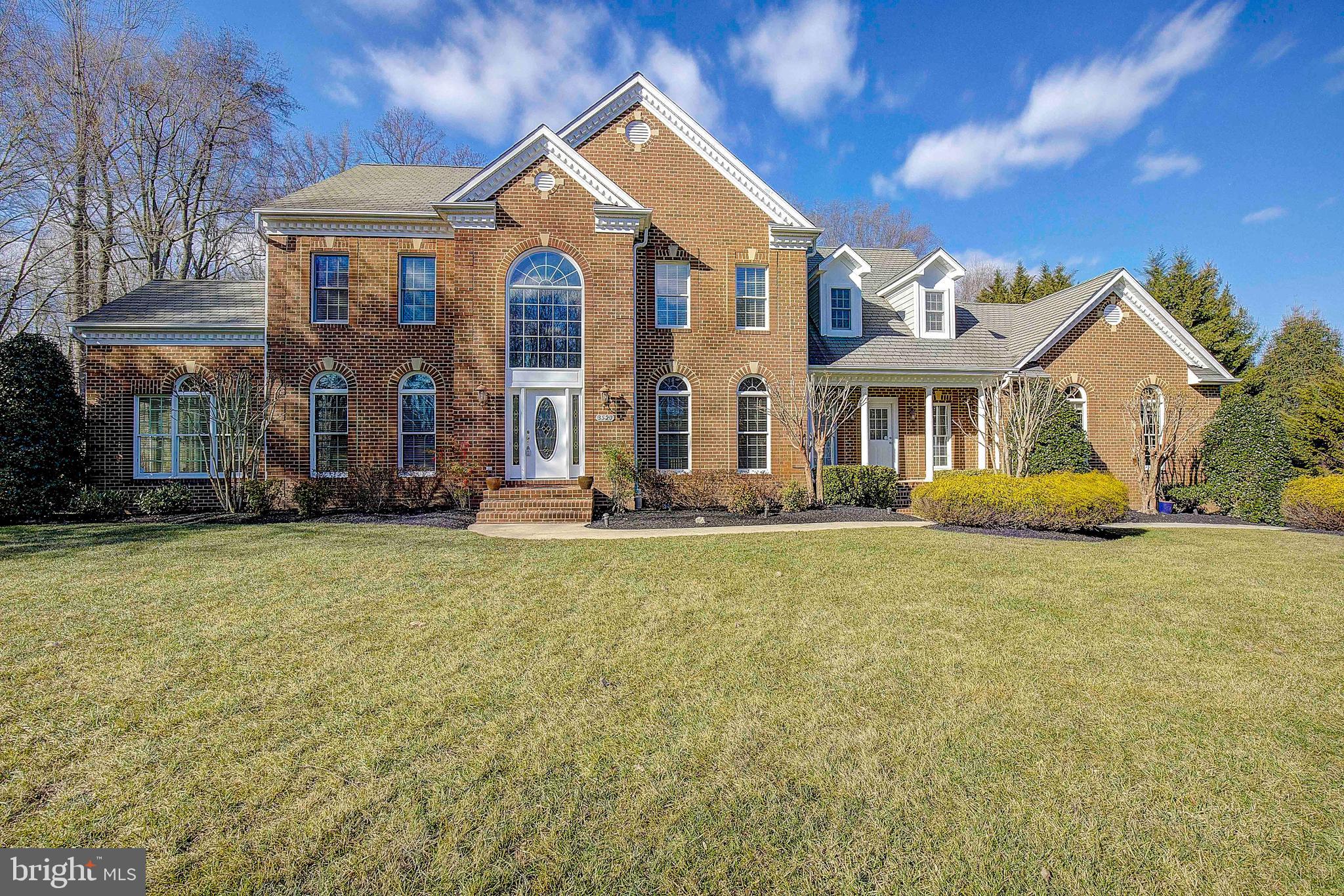 This stately colonial is situated on a gorgeous 2.17-acre homesite that sits on the 4th tee box of the Golf Club at South River.  The property offers a serene private setting with a massive tier deck, an in-ground pool, a hot tub, and waterfalls. Plenty of parking on the extended driveway and 3-car garage. This is one of the community's largest floor plans, offering nearly 7,000 square feet of living space. The expansive main level offers an open foyer, formal dining and living rooms, a sunroom, an in-home office, and a family room with a gas fireplace. The centerpiece on this floor is the gourmet kitchen with ample counter space and a large breakfast room. The conveniently placed laundry room is right off the kitchen with a second entrance, mud room, and a half bath. The upper level offers four generous bedrooms and three full baths, including a vast primary bedroom with a recently remodeled master bath and gas fireplace. Fresh carpet has been installed throughout the property, and all the bathrooms have been upgraded. The entire interior has been recently painted. The home is complimented with a fully finished lower level that provides a 5th bedroom, 4th full bath, huge rec room, built-in bar, and large exercise room. This fantastic property is perfect for entertaining and can support large gatherings.