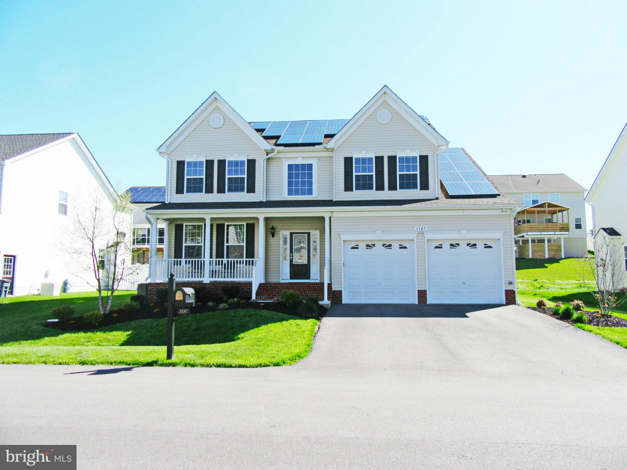 Green House..fantastic savings/solar panels! Gourmet Kit w/lg isl, gas cooktop, dble wall ovens and granite counters. Sep DR, Formal LR, Fam Rm w/gas FP...hdwd throughout main lvl. Grand Mstr Ste w/WIC, lux bath w/soak tub, sep shwr & sep sinks. Spacious BRs. Finished basement features full ba, lg rec rm and media room. Within walking distance to water, walkways.