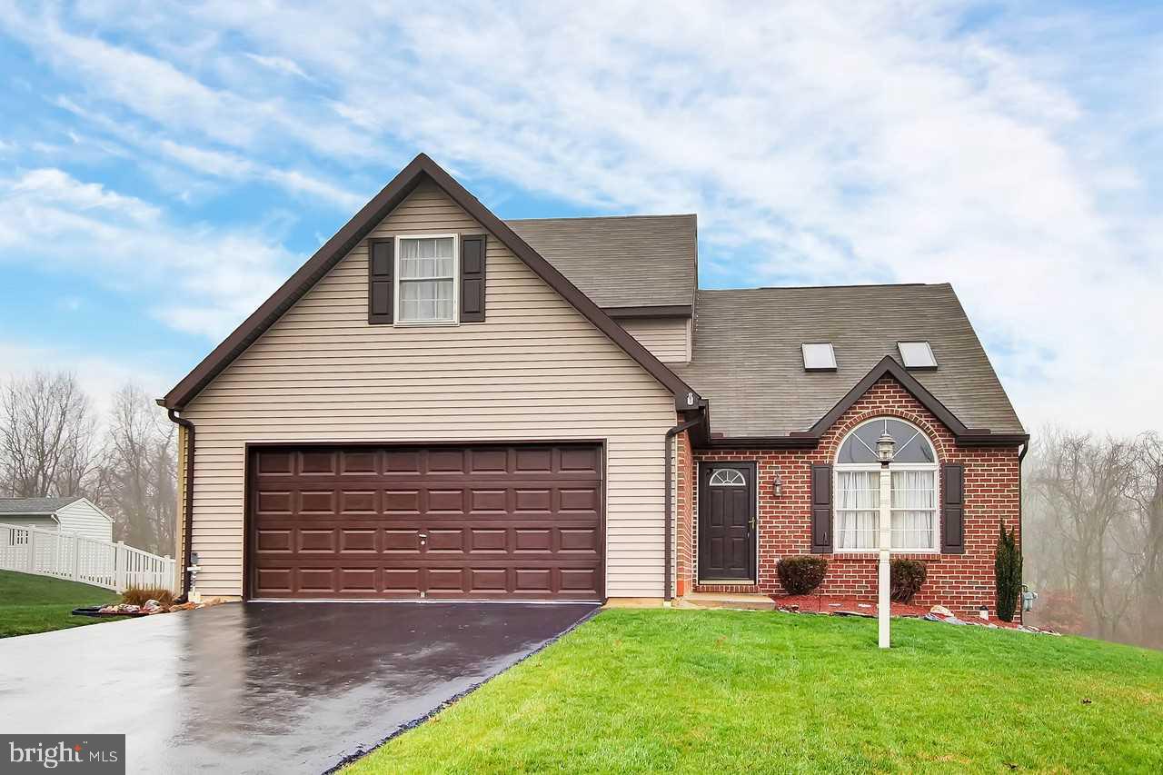WOW!! This contemporary beauty shouts "BUY ME" from the 1st floor master bedroom to the lower level family room! This is home sweet home! Neutral decor thruout. Open staircase   Large and spacious bedrooms   Open floor plan   Loft   New flooring in DR and Kit   Gas stone faced fireplace in FR   First floor laundry   Oversized 2 car garage. Located near cul de sac. Close to all conveniences as well as routes 30 and 83 for easy commutes.