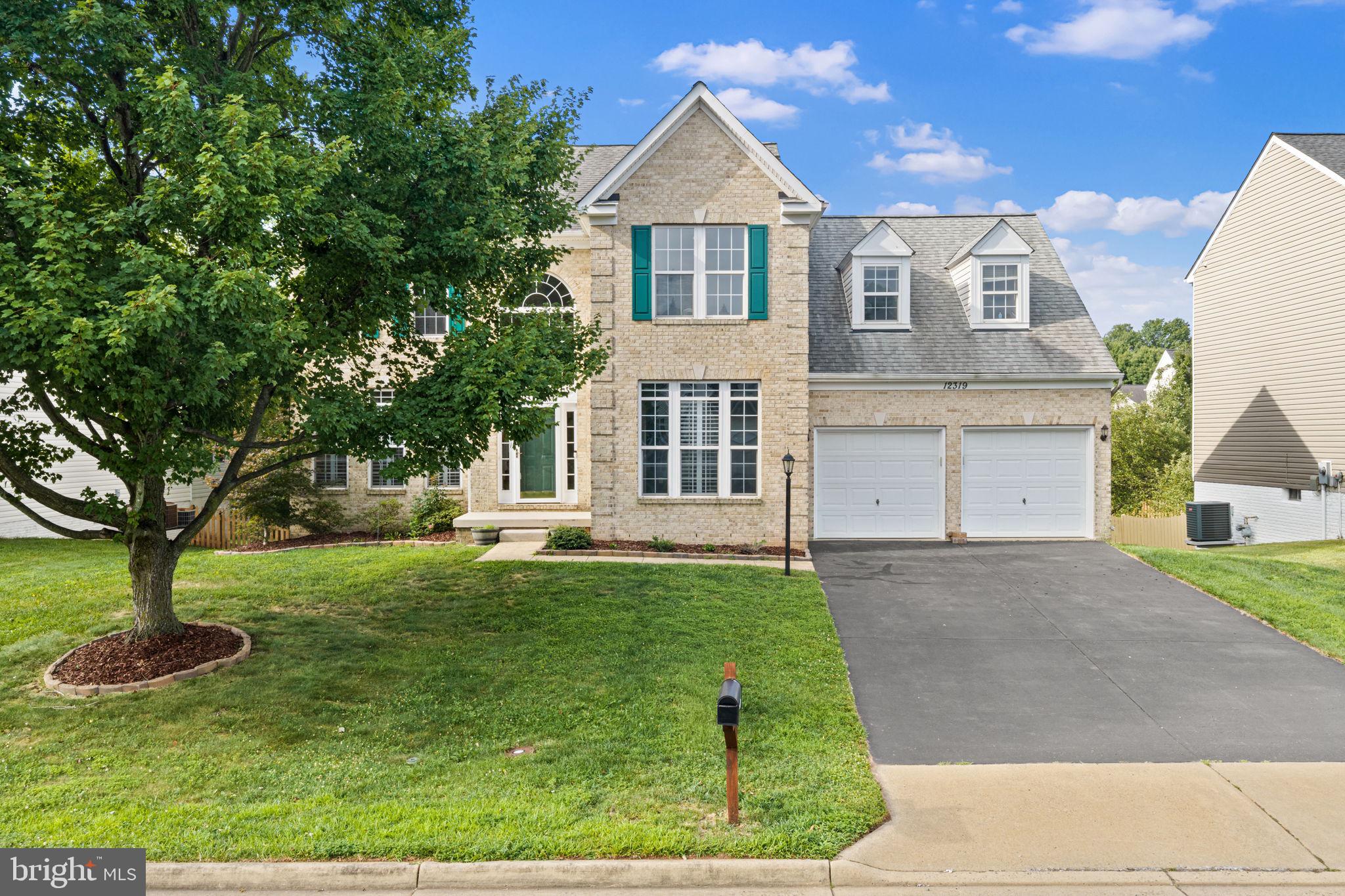 Must see this stunning home, where timeless elegance meets modern comfort in one of Bristow's most desirable communities. This exceptional 5-bedroom, 3.5-bath residence offers over 4,500 square feet of beautifully finished living space designed for both refined entertaining and everyday living.

A grand two-story foyer welcomes you into an open, light-filled floor plan featuring rich hardwood flooring, custom millwork, and spacious formal living and dining rooms. The heart of the home is the gourmet kitchen, complete with granite countertops, abundant cabinetry, stainless steel appliances,  overlooking the inviting family room with a dramatic stone fireplace.

Step outside to a spacious deck and fully fenced backyard—perfect for outdoor entertaining, summer barbecues, or quiet evenings under the stars.

The luxurious primary suite offers a private retreat with generous walk-in closets and a spa-inspired bath featuring dual vanities, a soaking tub, and a separate shower. Spacious secondary bedrooms provide comfort and flexibility for family, guests, or a home office.

The finished walkout lower level is ideal for entertaining or multigenerational living, offering an expansive recreation room, additional bedroom, full bath, and ample storage.

Perfectly situated near premier shopping, dining, parks, golf, wineries, and major commuter routes, this remarkable home combines luxury, convenience, and exceptional craftsmanship. Every detail has been thoughtfully designed to create a residence that is as impressive as it is welcoming.