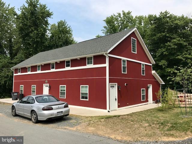 Fully renovated apartment and charming unit located within a multi family building, in the town of round hill. Kitchen with modern stainless appliances, granite bathroom, washer/dryer and instant hot water. Two bedroom, office loft and open family room with exposed timber beams. Available ASAP, rent includes Water, Natural Gas and Trash removal.  Unit 201 is located on the Right side of the building, first door near the road.