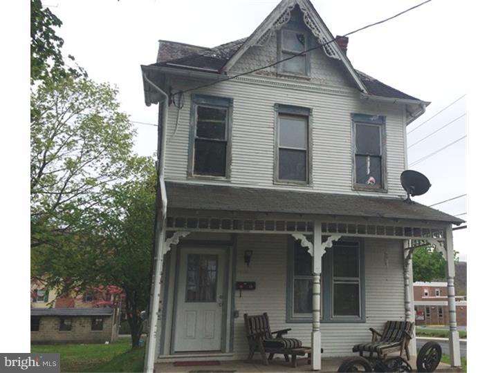 Calling all investors!  Looking for your next project?  Here it is! Unique Antietam property with tons of potential.  Generous room sizes, charming details and 12 garages... you can live the house and pay the mortgage with the garage rentals! Property being sold as-is, buyer is responsible for any municipal inspections/repairs as required. All garages but one are rented and home is currently rented too at $1270/month.  Tenant will stay if you like!  This home has the potential to shine once again, call today for your personal tour!