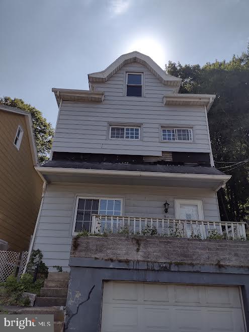A diamond in the rough! Single home in Blue Mountain School District.   3 BR, 1 BA, attached 
garage, off street parking.  Fenced in yard.  Home needs  repairs.  Daytime showings only. There are personal 
items in the house that will be cleaned out.   Cash or 203K rehab loan only.