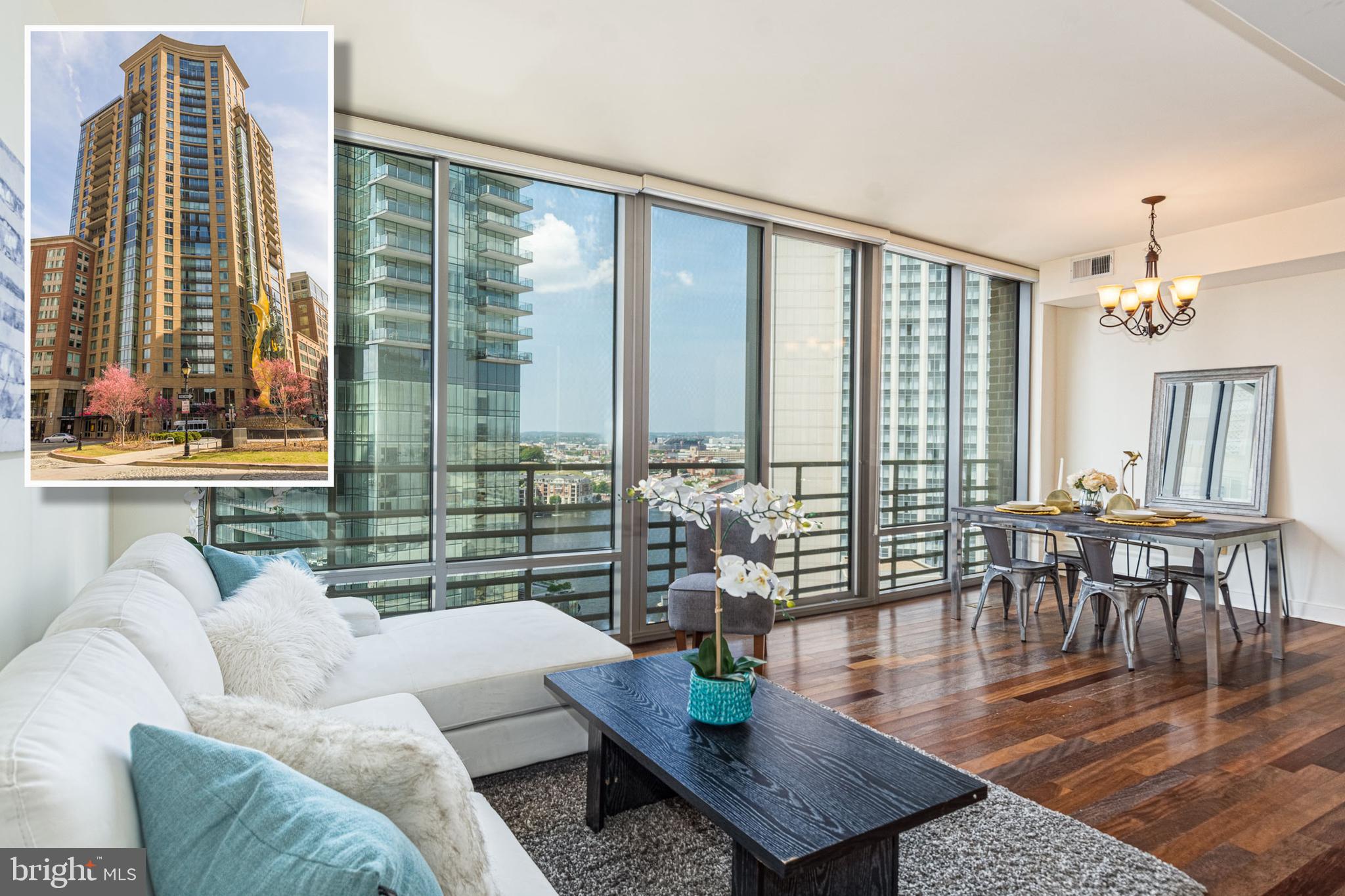 CONTEMPORARY ELEGANCE RADIATES THROUGHOUT THIS HARBOR EAST CONDO WITH CAPTIVATING VIEWS! Features include an open floor plan with a spacious living room & dining area w/ floor to ceiling windows w/ custom blinds, designer kitchen w/ granite counters, ss appliances, & tile backsplash, 2 bedroom suites w/ full baths, & 2 car parking! Located in the heart of Harbor East - enjoy some of the best restaurants and shopping that Baltimore has to offer! This is city living at its best!
