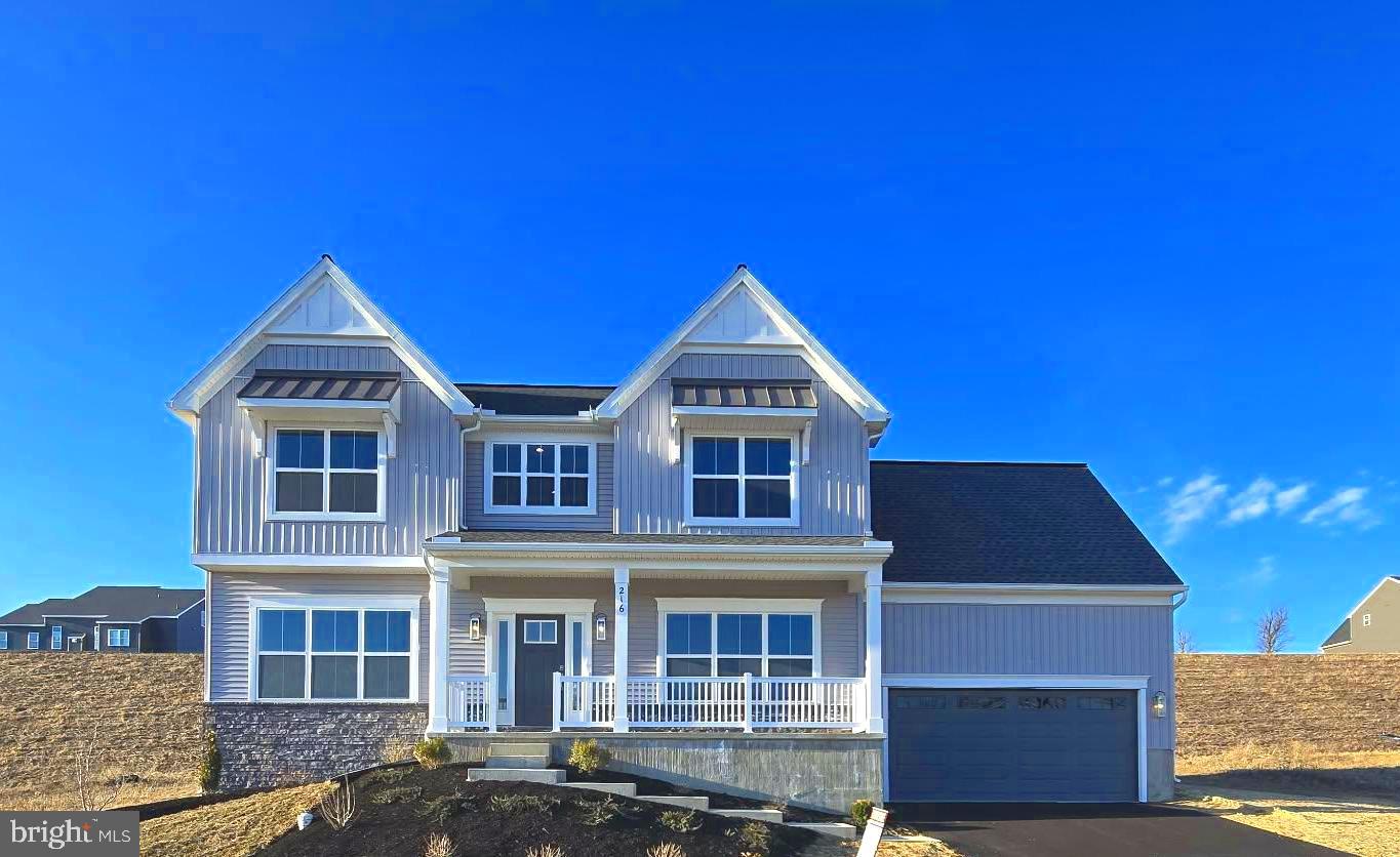 ✨ Almost New | Move-In Ready ✨

This thoughtfully designed 2-story home offers 9’ ceilings on the first floor and a 2-car garage with mudroom entry. A welcoming front porch leads into the foyer, where stylish vinyl plank flooring flows from the dining room throughout the main living areas. Just off the foyer is a versatile, carpeted flex space, perfect for a home office or bonus room.

The open-concept kitchen is beautifully appointed with stainless steel appliances, quartz countertops, a tile backsplash, and a large center island, seamlessly connecting to the family room featuring a fireplace and sliding glass doors to a rear deck—ideal for entertaining.

Upstairs, the owner’s suite is a private retreat with a double bowl vanity, 5’ shower, and a spacious walk-in closet. Three additional bedrooms, a full bathroom, and a convenient second-floor laundry room complete the layout.