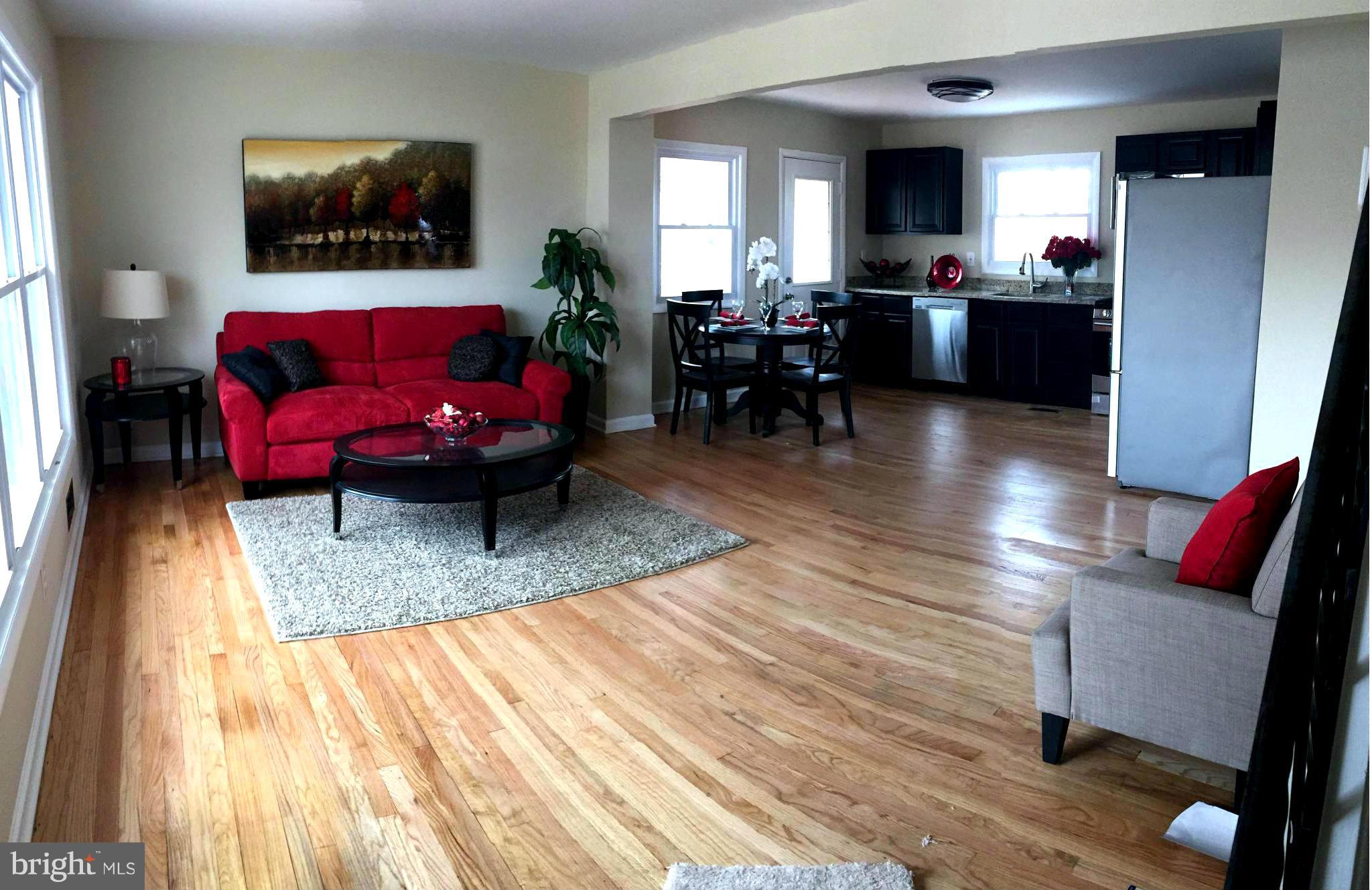 1980 TOTAL SQ FEET.  RENOVATED HOME !!!  4 BEDROOMS AND TWO FULL BATHS.  NEW EVERYTHING !!  NEW HVAC, NEW ELECTRIC BOX. NEW WINDOWS, REFINISHED HARDWOOD FLOORS, NEW KITCHEN CABINETS, NEW GRANITE COUNTERTOPS, NEW SS APPL.  FIVE BURNER STOVE. FRENCH DOOR REFRIGERATOR.  BUILT IN MICROWAVE.  NEW CERAMIC TILE BATHROOMS, TWO FAMILY ROOMS IN LOWER LEVEL, DECK OFF THE KITCHEN.  FENCED YARD WITH SHED.