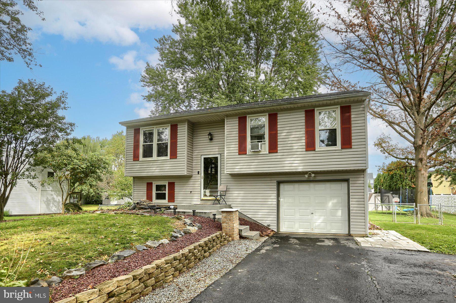 Well-maintained home on a large lot in Hempfield!   3 bedrooms, 1.5 baths.  Open floor plan upstairs with a sunroom that overlooks a large yard fenced-in yard. Finished lower level for additional living space.   One-car garage and plenty of parking out front.  You'll love relaxing out back with the covered porch, patio and hot tub.  Schedule your showing today!