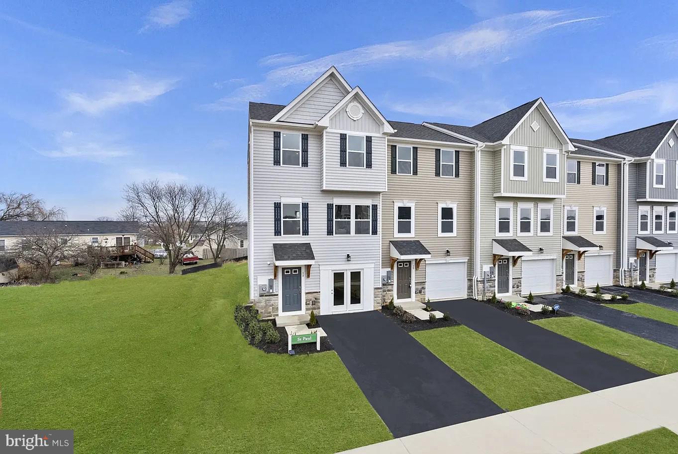 Welcome to 19 Tumblehome Rd, a beautifully designed 4-bedroom, 3.5-bath townhome nestled in a peaceful, wooded setting in Inwood, WV. This modern, spacious home offers comfort and style in a serene location, perfect for anyone seeking a stylish and functional living space. Enjoy the convenience of contemporary design combined with the beauty of nature right outside your back door.
Key Features & Amenities: