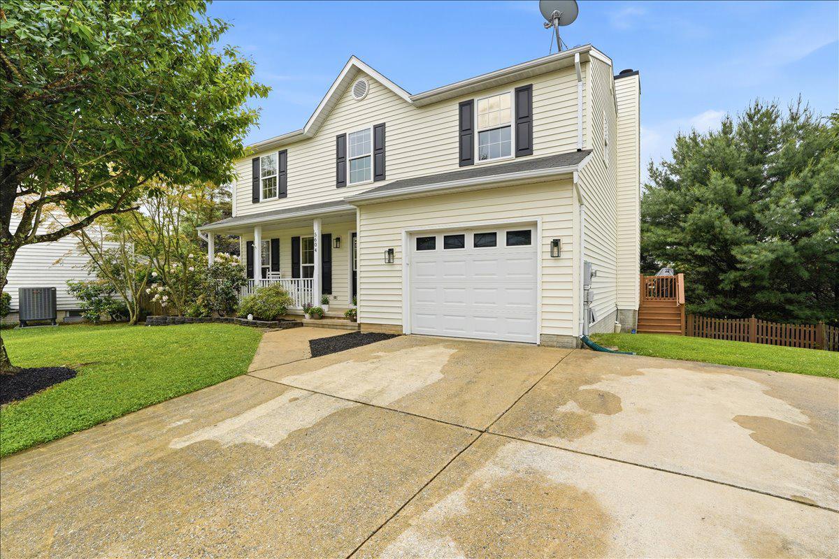 Welcome to this beautifully appointed single-family home in the highly sought-after New Market West community! Tucked away on a cul-de-sac and walkable to local schools, this home offers the perfect blend of comfort, style, and functionality. Featuring 5 bedrooms, 3 full baths, and 1 half bath, the thoughtfully designed layout is ideal for both everyday living and entertaining. The heart of the home is the stunning kitchen, complete with a massive quartz island, stainless steel appliances, oversized sink, and seamless flow into the dining area and cozy living room with fireplace and deck access. Just off the dining space, the walk-in pantry is a true standout with additional counter space, soft-close cabinetry and drawers, beverage fridge, and nugget ice maker. The main level also includes a welcoming foyer, private home office, and hardwood flooring throughout. Updated light fixtures throughout most of the home add a fresh, modern touch. Upstairs, the spacious primary suite features an ensuite bath with skylight, separate shower and toilet area, and a walk-in closet. All upper-level bedrooms include ceiling fans for added comfort. The finished lower level offers durable LVP flooring, a large rec room, full bath, storage areas, laundry space, and a versatile 5th bedroom currently used as a home gym. Enjoy outdoor living on the rear deck overlooking the backyard with fire pit. Residents of New Market West enjoy fantastic neighborhood amenities including two playgrounds, tennis courts, and a pavilion. This home truly has it all!