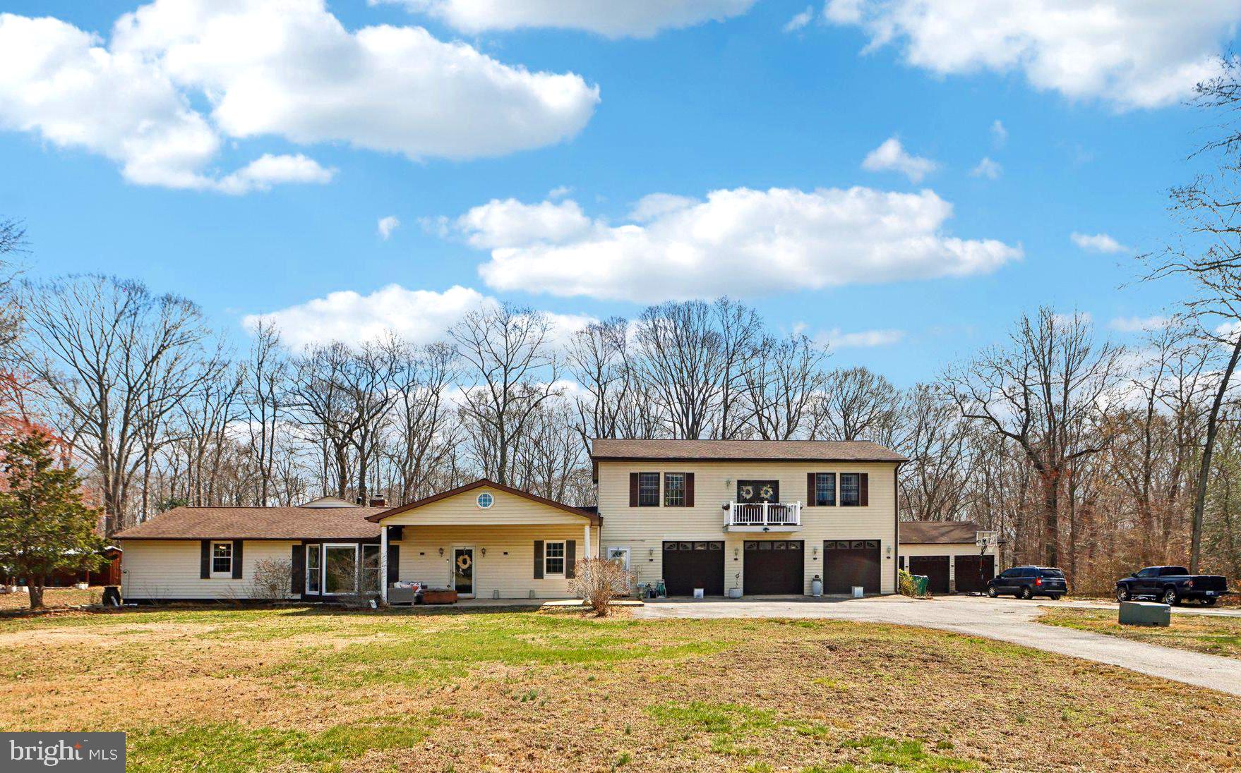 Recently Updated Unique Home on 10+ Acres of Secluded Privacy!This property has so much potential for all your farmette dreams!  Nestled on over 10 acres of serene, private land, this one-of-a-kind property offers both a beautifully upgraded main living area and a spacious in-law apartment. Whether you're looking to entertain or unwind in your own slice of paradise, this home has it all. Gorgeous upgraded kitchen featuring sleek granite countertops and brand-new stainless steel appliancesExpansive Great Room with a cozy gas fireplace, perfect for relaxing or gathering with loved onesTwo luxurious master suites for ultimate comfort and privacyThoughtfully designed spaces throughout that provide both function and styleIn-Law Apartment: Complete with a 1 bedroom, 1 bathroom, and a convenient kitchenette – perfect for extended family or guests!A 6-bay garage, offering ample space for all your vehicles, toys, or hobbies.Multiple areas inside and outside the home to entertain or simply enjoy the tranquility of your surroundingsThe expansive acreage gives you room to roam and relax, with no HOA restrictions to limit your freedomThis is a rare opportunity that won’t last long! Becasue of the property size, seller prefers as-is offers.