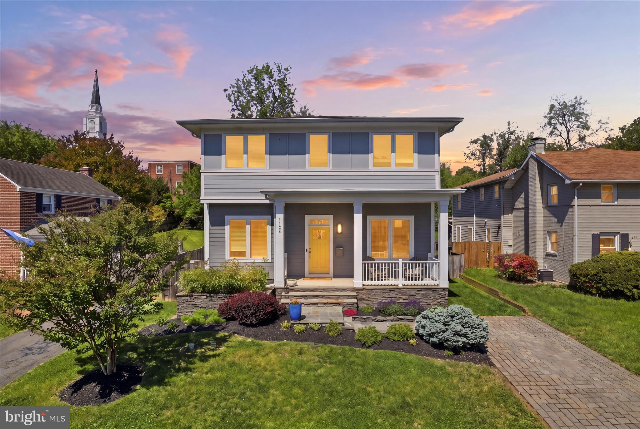 Custom-built newer construction in one of Arlington’s most sought-after neighborhoods, this exceptional residence offers a rare and thoughtfully designed 5-bedroom, 5-bath layout with an inviting, open-concept floor plan that perfectly balances everyday comfort with elevated living.

From the moment you arrive, the warm, welcoming front porch sets the tone—an ideal spot to relax, connect with neighbors, or unwind at the end of the day. Inside, the home opens to expansive, light-filled living spaces enhanced by soaring 10-foot ceilings, rich hardwood floors, extensive crown molding, and custom built-ins that add both sophistication and function.

At the heart of the home, the gourmet designer kitchen is as beautiful as it is practical—featuring high-end appliances, a large center island, and abundant workspace—seamlessly connecting to the main living and dining areas for effortless entertaining and everyday living. The sun-drenched living room is anchored by a striking stone gas fireplace, creating a cozy yet refined gathering space.

A spacious mudroom with custom built-ins and ample storage keeps everything organized and out of sight—an often-overlooked feature that makes a big difference in day-to-day living.

Upstairs, the luxurious primary suite delivers a truly unique and hard-to-find design. Two private primary bathrooms—each with its own vanity—are connected by a shared shower, offering an ideal combination of privacy and shared functionality. A private balcony off the suite provides a peaceful retreat, perfect for morning coffee or quiet evenings.

The additional bedrooms are generously sized, each offering comfort, flexibility, and access to well-appointed baths—ideal for family, guests, or home office needs.

The fully finished lower level adds even more versatility, featuring a private walk-out entrance, a bedroom, and a full bath—perfect for guests, a live-in nanny, or multigenerational living. This level provides a comfortable, private space that can easily adapt to your needs.

Outdoor living is just as impressive, with a screened-in porch for year-round enjoyment and a beautifully maintained backyard designed for both relaxation and entertaining. Gather around the fire pit on cool evenings, host weekend get-togethers, or simply enjoy the privacy of your outdoor space. A storage shed adds convenience without compromising the yard’s appeal.

The location truly sets this home apart. Enjoy exceptional walkability—just a quarter mile to grocery stores and a pharmacy, and only half a mile to the vibrant Westover Village, known for its local restaurants, coffee shops, beer garden, and library. A bus stop just one block away offers express service to the Ballston Metro, making commuting simple and convenient.

Zoned for Swanson Middle School and ideally positioned in a highly desirable Arlington neighborhood, this move-in-ready home delivers the perfect combination of thoughtful design, modern luxury, and unbeatable convenience.