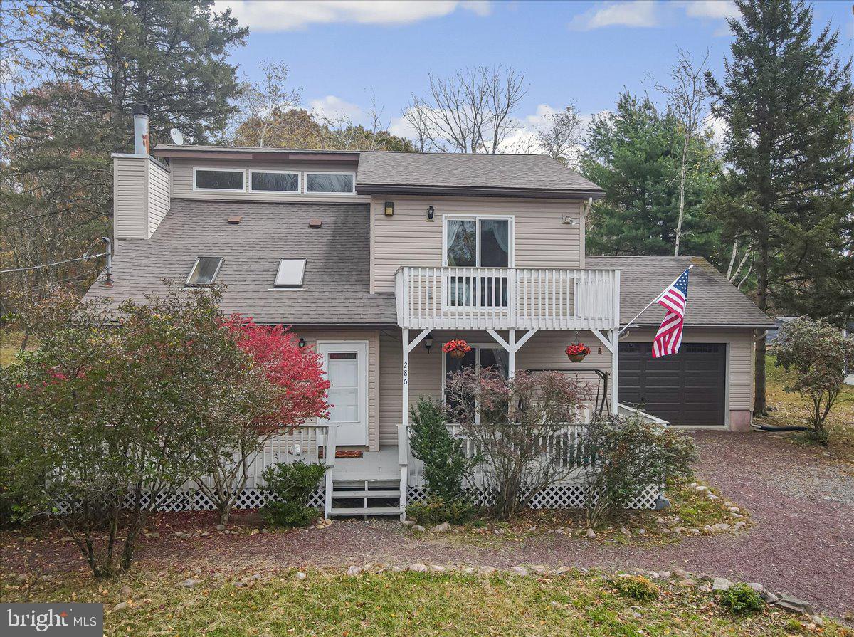 Welcome to your turnkey Pocono retreat in the amenity-filled Towamensing Trails community! Designed for relaxing weekends, entertaining guests, and maximizing short-term rental potential, this spacious and flexible home offers the perfect blend of comfort, fun, and year-round appeal.

Inside, the open-concept living area features soaring ceilings, a cozy wood-burning fireplace, and an inviting layout that brings everyone together. The sunroom steals the show with its built-in bar and game room setup, creating the ultimate space for hosting after a day at the lake, slopes, or trails.

With 3 bedrooms plus a bonus room that easily functions as a 4th sleeping area, along with 2 full bathrooms, there’s plenty of room for guests, large gatherings, or vacation rental flexibility. Brand-new mini split systems in every room provide efficient heating and cooling in every season.

Step outside and enjoy multiple deck spaces designed for entertaining and unwinding, including a brand-new hot tub perfect for cool Pocono evenings under the stars.

The main level features a spacious bedroom with deck access, a full bath, bonus room, laundry area, and garage access for added convenience. Upstairs, the loft overlooking the living space offers a second lounge area, along with another full bath, a large bedroom with private deck access, and a bunk room ideal for maximizing sleeping capacity.

Whether you’re looking for a full-time residence, weekend escape, or income-producing investment property, this home checks all the boxes.

Towamensing Trails amenities include a 190-acre lake with beach access, outdoor pool, clubhouse, restaurant & bar, sports courts, playgrounds, and year-round community events,  all just minutes from skiing, hiking, rafting, and top Pocono attractions.

A true Pocono getaway built for making memories.