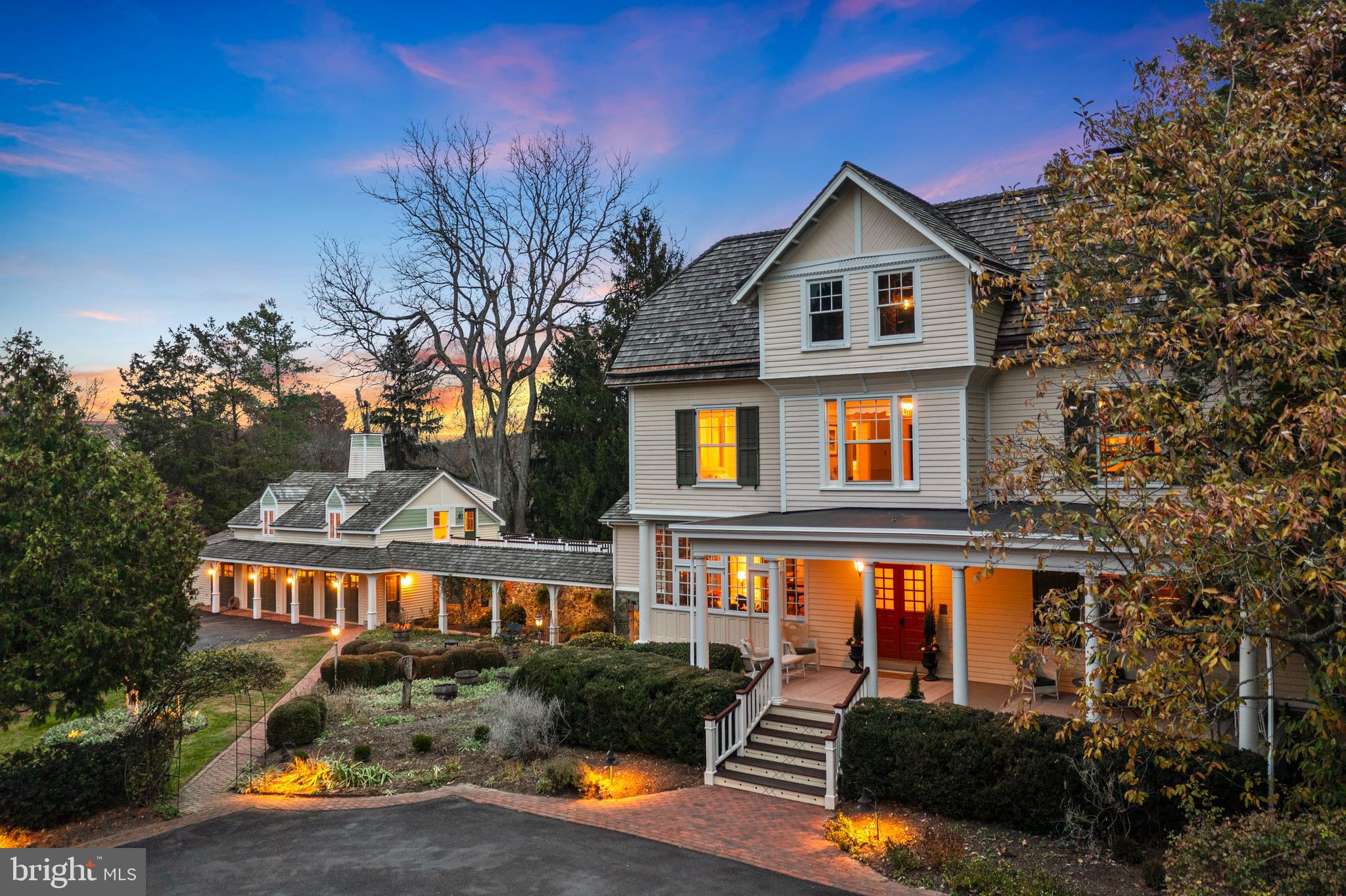 A lifestyle. A sanctuary. A home with soul.
Some properties offer more than shelter, security, and living space—they offer a way of living.

Heartsease is one of those rare homes. Built in 1869 and named for the wildflower symbolizing tranquility and belonging, this estate carries qualities no new construction can replicate: authenticity, craftsmanship, character, and an elevated lifestyle shaped by history and nature.

Step through the double front doors and you enter a world of soaring ceilings and natural light pouring through tall windows. Original woodwork, original hardware, and fireplaces anchoring every formal and casual space make it easy to imagine the Victorian era unfolding around you. Beside the foyer, a richly paneled library with its own fireplace becomes an inspiring work-from-home sanctuary.

The chef’s kitchen—custom cherry cabinetry and professional appliances—opens into a great-room with dining space and a vaulted ceiling. From here, the flow extends to the formal dining room and directly onto the expansive outdoor deck. It’s a layout designed to shift effortlessly from intimate dinners to spirited celebrations.

Up the wide formal staircase, the second floor offers four bedrooms and four-and-a-half baths, each overlooking gardens and woodlands for a sense of privacy and retreat. Above, the walk-up attic is already roughed-in, ready to become additional bedrooms, a playroom, a studio, or even a full third-floor suite.

The ground level widens the lifestyle with a stone-walled drawing room, a media room, wine cellar, gardening room, larder, full bath, and access to the breezeway with hanging swings, a patio with fire pit, and a hot tub gazebo. An elevator connects all floors with ease.

Outside, specimen trees, winding paths, historic gardens, and a tranquil fountain create the feeling of true country living. A secluded swimming pool and patio sit on the lower quarter, while the upper lawn is large enough for a wedding tent. With broad decks, multiple patios, expansive lawns, and a classic front porch, this is a home meant for living well.

A detached three-car garage adds a small barn and a finished second floor—1,200 square feet of flexible space perfect for a nanny suite, office, art studio, or music studio.

Set on 5.25 acres of privacy amid the rolling farmland of southern Chester County, and minutes from a vibrant college town—less than an hour from two major cities and three airports—Heartsease is more than a home. It’s an experience. A place to live, create, entertain, and breathe. A rare blend of history, privacy, and lifestyle ready for its next steward.