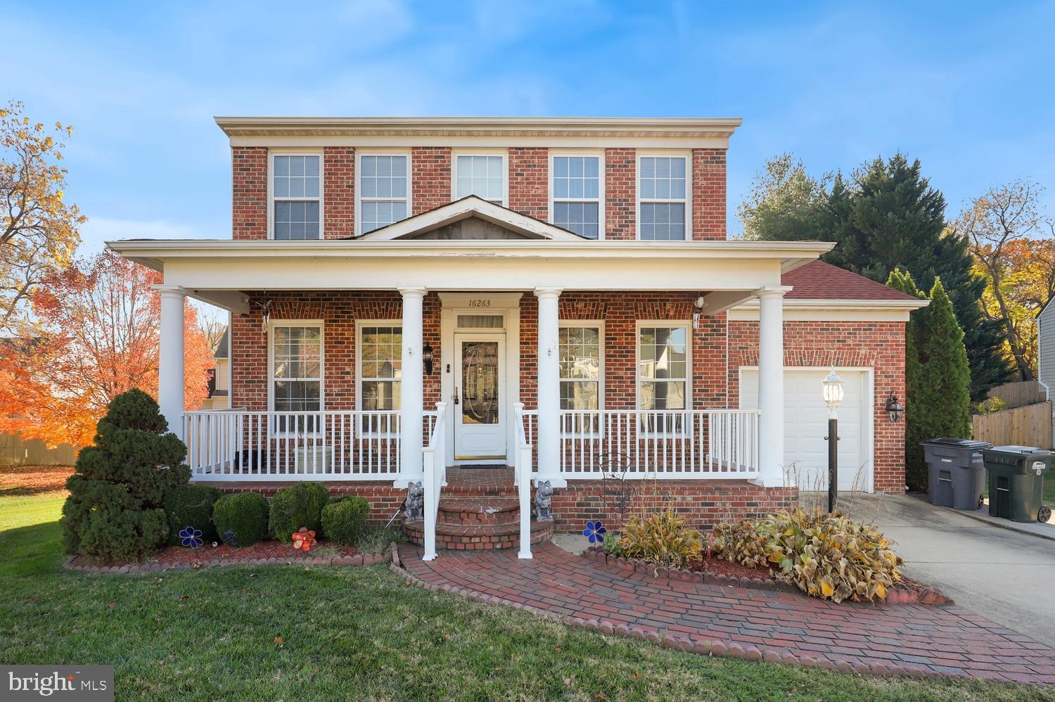 Motivated Seller!!!  Home is now vacant and ready for it's new owner!! Beautiful brick front home with the most inviting masonry front porch located on a quiet cul-de-sac lot.  The Bruce hardwood floors are in perfect condition on the top 2 levels, no carpet at all in this home. Ceramic tile in the kitchen with stainless steel appliances, gas cooking and granite countertops.  Tons of cabinets and a pantry as well.  The sliding door leads out to the large deck off the back looking out to the flat backyard.  There is a generous sized shed in the backyard to store the lawn equipment and exterior items. The cozy family room off the kitchen has a gas fireplace.  Formal living and dining room as well on this level.  The lower level also has ceramic tile floors and a walkup to the backyard.  The large rec room has tons of recessed lighting, modern lighting and a sink that can be easily converted to a wet bar.  There is a full bathroom  and another bedroom/den.   The upper bedroom level has a huge primary suite and recently updated bathroom with modern style tile, a frameless glass shower, soaking tub and double sink vanity.   The hall bathroom has also been recently updated.   There is a one car garage with a long driveway and a lawn irrigation system.  Newer roof - 4 years old.  Outside a/c unit 4-5 years old and water heater is newer as well.  So convenient to shopping, restaurants, rt 1, 95, Quantico and VRE!!