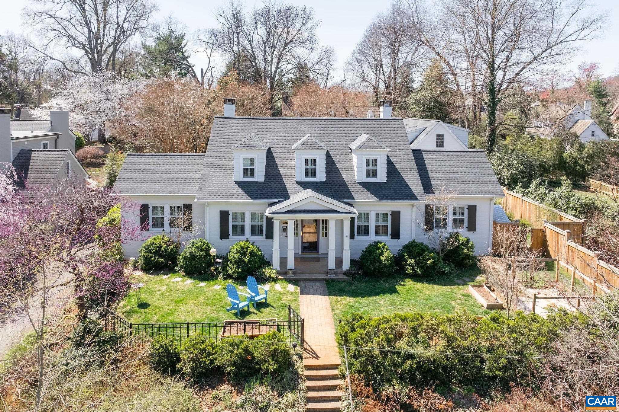 Located on a lovely, low traffic street within easy walking distance of UVA and Barracks Road amenities, this c. 1935 brick home has been meticulously cared for and improved by its current owners.  All is light, bright and 100% move in ready, incl' the new kitchen, 1st floor primary suite and absolutely divine new screen porch off the living room, all completed in the last few years by Bill Norton/Rockpile Construction. The huge walk-in primary closet with laundry is a wonderful surprise for a home of this vintage.  Additional features incl' a pet friendly, entirely fenced yard, sunny 1 bedroom apartment over the 2 car garage and native plantings galore.  Oodles of hellebores and daffodils right now.  No exposure to Route 29 or other busy streets, the home sits gracefully above Fendall Avenue awaiting its new owners.,Solid Surface Counter,Fireplace in Family Room,Fireplace in Living Room