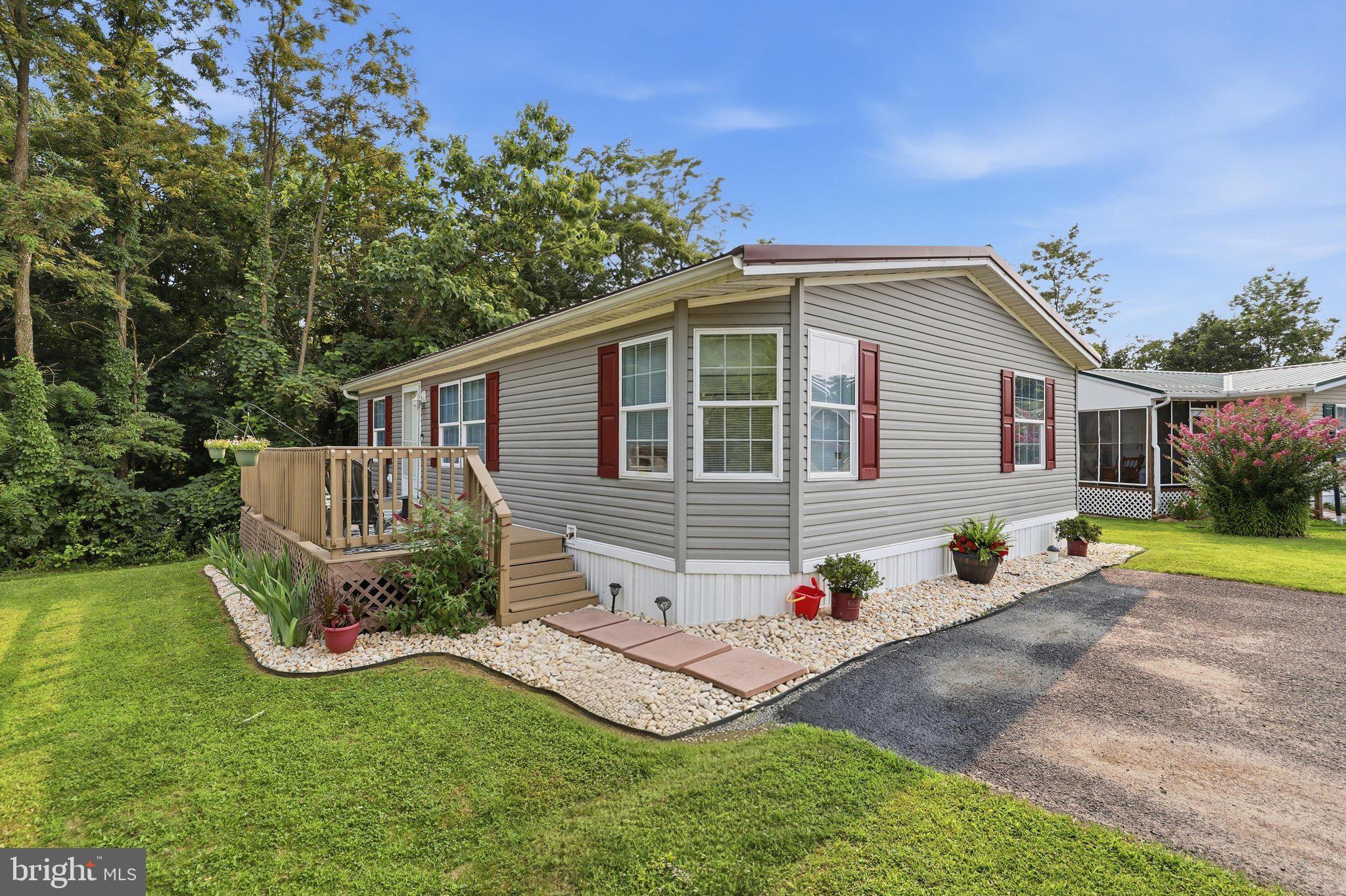 Starter home?  Down sizer?  Tired of renting?  Here you go!  WELCOME HOME to 10655 Bailey Springs Lane (lot 23).  This three bed, 2 full bathroom home is absolutely ready for its next owner.  Some great features include: kitchen pantry, walk in closet, laundry room and an oversized storage shed.  Lots of freshening up has been done so you don't have to!  Fresh paint, resealed driveway, fresh landscaping and landscaping rock, re-stained deck, replaced stove and dishwasher, custom shelf in the living room, new carpet AND A NEW ROOF.  Truly move in ready.  
**Buyers must be approved by the community.   Pet restitutions and breed restrictions apply.