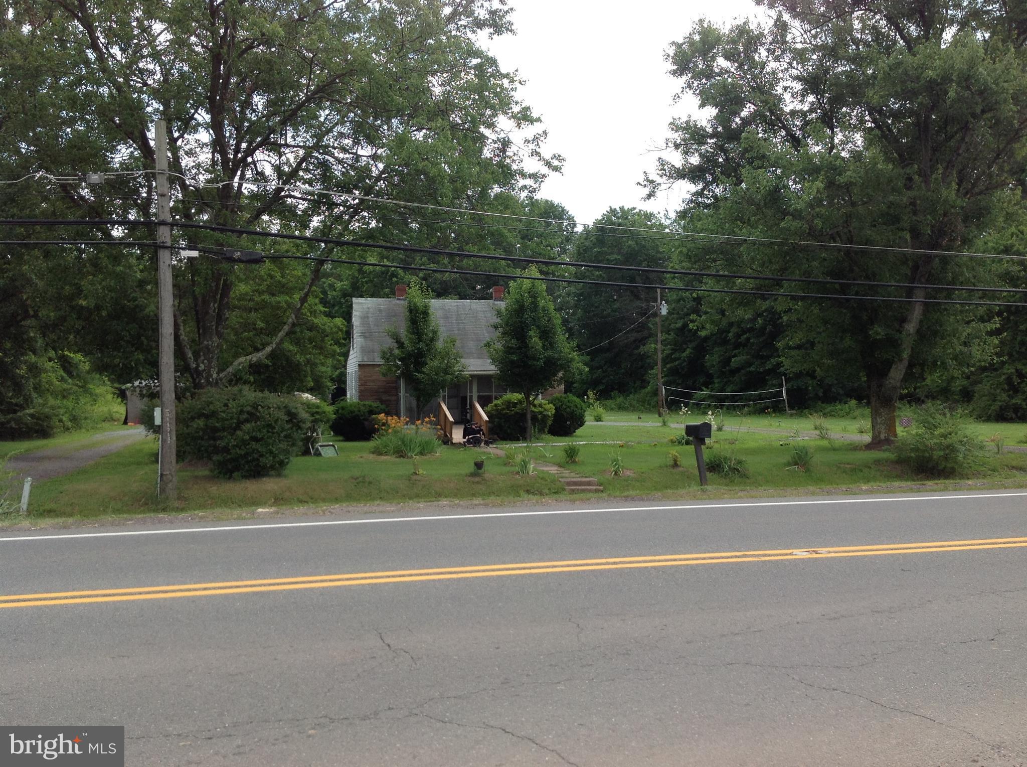 Zoned HI - Commercial.  Present land use is residential. This 3 Acre lot has full potential to become what you choose, located 2 miles from town. Great investment property with land value on the rise.