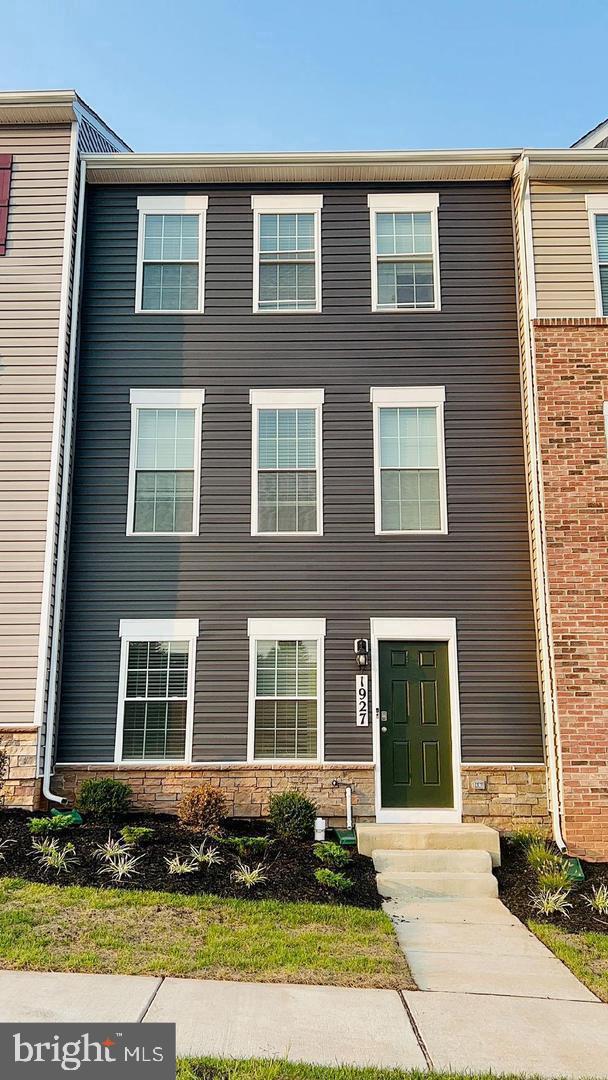 Welcome to this beautifully maintained, townhome offering the perfect blend of modern design, functionality, and convenience. Built with today’s lifestyle in mind, this three-level residence delivers almost 1,800 square feet of thoughtfully designed living space, featuring 4 spacious bedrooms and 3.5 well-appointed bathrooms. From the moment you step inside, you’ll notice the attention to detail and elevated finishes throughout. The main level showcases an open-concept layout with soaring 9-foot ceilings, creating a bright and inviting atmosphere ideal for both everyday living and entertaining. At the heart of the home is a stunning chef-inspired kitchen, complete with granite countertops, stainless steel appliances, an oversized center island, upgraded cabinetry, and sleek luxury vinyl flooring, perfect for hosting or gathering with family and friends. The lower level offers exceptional flexibility, providing a bonus space that can easily function as a private home office, recreation room, guest suite, or fourth bedroom; tailored to fit your needs. Upstairs, you’ll find generously sized bedrooms, including a comfortable primary suite designed for relaxation and privacy.

Step outside and take in the scenic surroundings, this community is known for its picturesque views and peaceful setting, all while being just minutes from the vibrant energy of downtown Frederick and conveniently located near Fort Detrick. Enjoy easy access to shopping, dining, major commuter routes, and everything the area has to offer. Complete with a two-car garage and modern finishes throughout, this home presents a rare opportunity to lease a move-in-ready property in a highly desirable location.