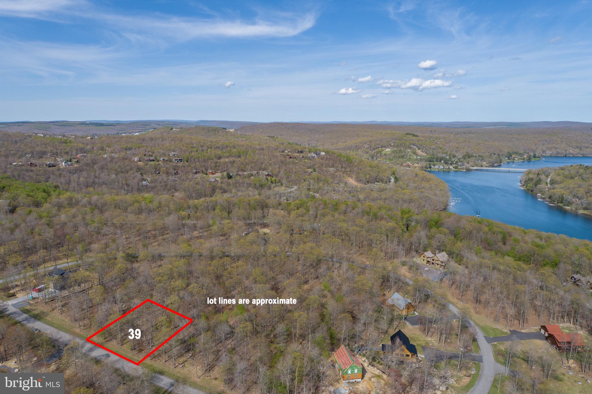 Lot 39 Fern Loop provides an opportunity to build your mountaintop dream home! Located in the Sandy Shores Heights community, this property offers a quiet setting with paved roads, electricity, water and sewer already at the site. Sandy Shores is just a few minutes drive to the top of Wisp Resort, and down the hill to all of the areas most sought after restaurants, Deep Creek Lake and all that the area has to offer Looking for a great opportunity to build your mountain getaway? Call today!