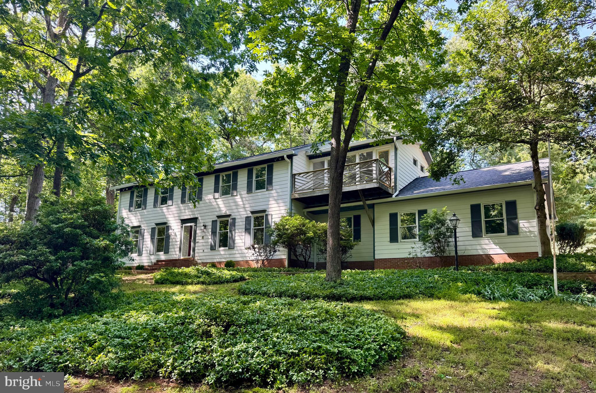 **Beautifully renovated throughout in 2026, this move-in-ready Great Falls home offers   4,000 finished square feet on a private, tree-lined 2-acre lot with NO HOA!** Ideally located just minutes from Great Falls Village, Tysons, Reston Town Center, shopping, dining, parks, and major commuter routes, this exceptional property combines modern updates, privacy, and endless potential in one of Northern Virginia's most sought-after communities.

This spacious 4-bedroom, 2.5-bath Colonial features an oversized 2-car garage and an extensively renovated interior showcasing engineered white oak flooring, fresh Sherwin Williams Greek Villa paint, updated lighting and plumbing fixtures, and beautifully renovated kitchen and bathrooms throughout.  

The heart of the home is the stunning chef's kitchen featuring new white cabinetry, quartzite countertops and full-height backsplash, an oversized island with seating and storage on both sides, pantry, updated stainless steel appliances, and a dedicated beverage center with wine storage and beverage refrigerator. The main level also offers formal living and dining rooms, a spacious family room with a gas fireplace and French doors to the screened porch, a private office with exposed brick accent wall and skylights, a bright sunroom with skylights, and an updated laundry room with new washer and dryer.

Upstairs, the spacious primary suite includes two walk-in closets, a beautifully renovated spa-inspired bath with an oversized dual-head shower, plus a one-of-a-kind wellness room featuring a private sauna, balcony, cedar closet, and skylights. Three additional generously sized bedrooms and an updated hall bath complete the upper level.

The partially finished lower level includes a recreation room plus abundant unfinished space with rough-in plumbing for a future full bath, offering exceptional storage and outstanding potential for additional finished living space.

Recent interior improvements include new flooring throughout, fully renovated kitchen with new appliances, fully renovate laundry room with new washer/dryer, fully renovated bathrooms and new HVAC.  Exterior  improvements include new roof, gutters, and skylights. 

Outside, enjoy the privacy of two acres, a screened porch, and slate patio. With **NO HOA**, buyers have the flexibility to personalize the exterior and outdoor living spaces to suit their own vision. Sold **As-Is**. A rare opportunity to own a beautifully renovated Great Falls home on 2 private acres in an unbeatable location.