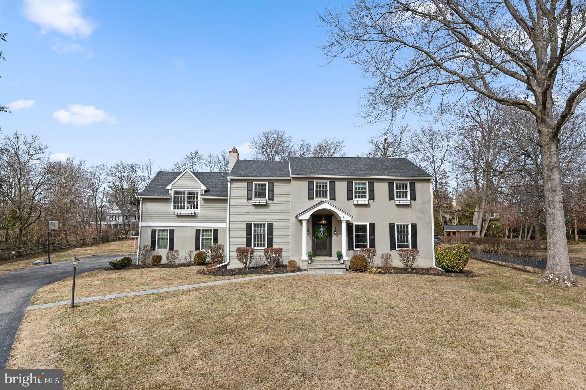 Welcome to 407 Meadowbrook Avenue, a spectacular home nestled in the heart of South Wayne. Perfectly situated on a large flat lot along a coveted quiet street, this residence offers the rare combination of a walk-to-Wayne lifestyle with expansive front and back yards—a true gem in Radnor Township.  Inside, gleaming hardwood floors set the tone for the inviting and versatile floor plan, where every space can be tailored to fit your lifestyle. The foyer opens to a flexible layout, allowing rooms to serve different purposes based on your needs. Currently, the front room functions as a large office, but it could easily transition into a formal living room that flows into the dining room, where a fireplace creates a warm and inviting ambiance.  The heart of the home is the  family room, also featuring a fireplace, which seamlessly connects to the gourmet kitchen. Thoughtfully designed with a breakfast area, large island, custom cabinetry, and soapstone countertops, this space captures stunning views of the backyard oasis. From the kitchen, step outside to a beautiful flagstone patio, perfect for outdoor entertaining and enjoying the privacy of the backyard. A mudroom with direct access to the attached garage provides convenience and functionality for daily living.

Just off the kitchen, a back staircase leads to an incredible second story bonus room. Featuring built-in cabinetry and massive Palladian windows, this sun-drenched space offers breathtaking views of both the front and back yards, making it ideal as a playroom, home office, or gathering space.

Upstairs, the exquisite primary suite is a true retreat, complete with an ensuite bath, a massive walk-in closet, and a conveniently located laundry closet. Three additional bedrooms and a well-appointed hall bath complete the second floor, offering comfort for family and guests alike.

The home’s finished lower level provides additional versatile living space, perfect for a media room, home gym, or recreation area. Additionally, a separate storage area ensures ample room for seasonal items and organization.

Step outside and enjoy the level backyard, a private haven perfect for entertaining, play, or simply unwinding in a peaceful setting.

With its unbeatable location, spacious design, and walkable proximity to Wayne, 407 Meadowbrook Avenue  offers the best of Main Line living—where charm meets convenience in one of the area’s most sought-after neighborhoods.

SHOWINGS BEGIN THURSDAY MARCH 6th at 11AM, pictures will be up on Wednesday March 5th.