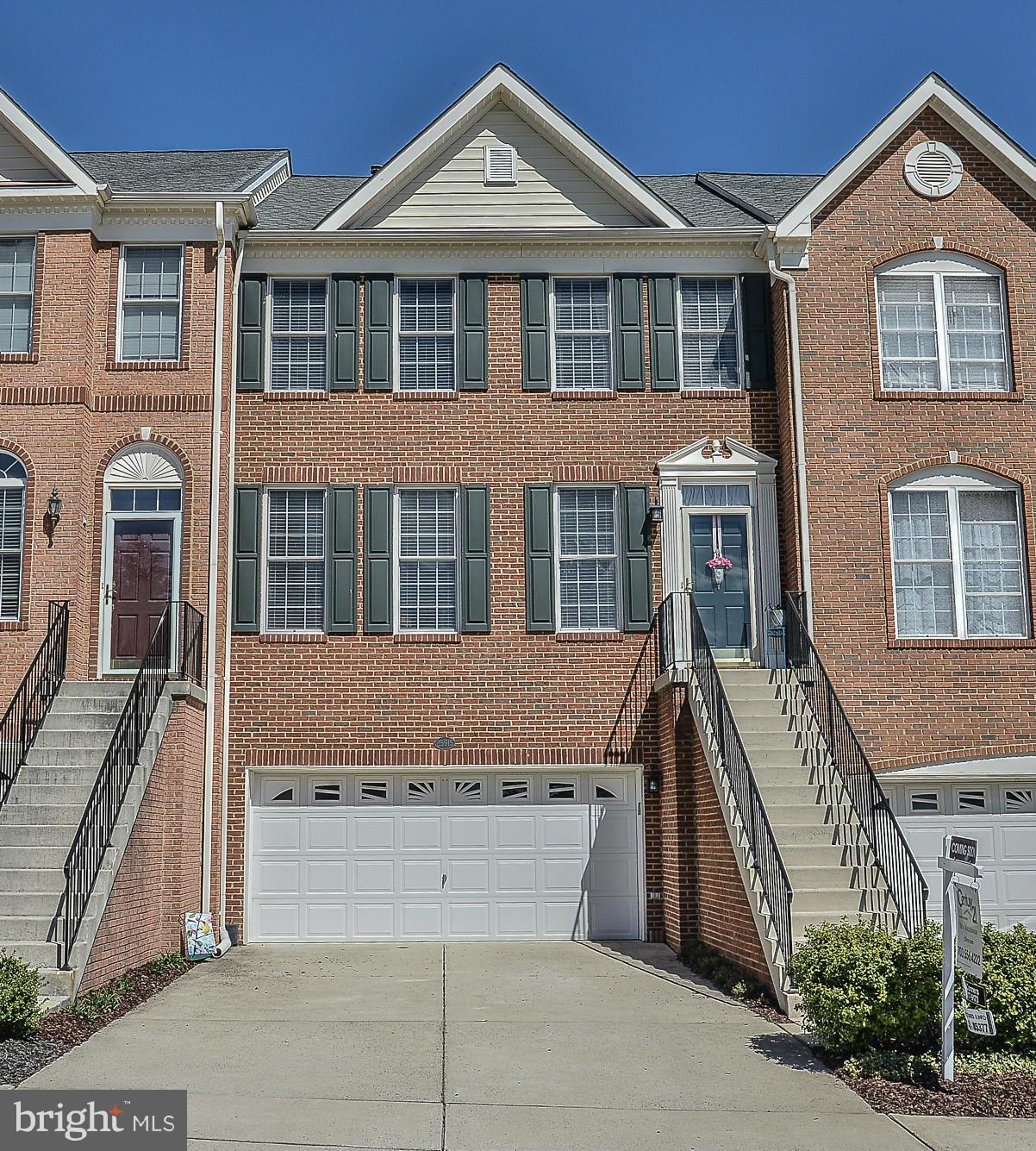 NEW LISTING! Stunning brick front townhome in South Riding! Picture perfect & impeccably maintained! Open floorplan features include hardwood floors on main level, 3 level bump-out, huge kitchen w/ island, sitting room w/ gas fireplace & breakfast nook. Vaulted ceilings on upper level. Huge luxury master suite w/ dual walk-ins, soaking tub, separate shower. Walk-out basement. Deck & fenced yard.