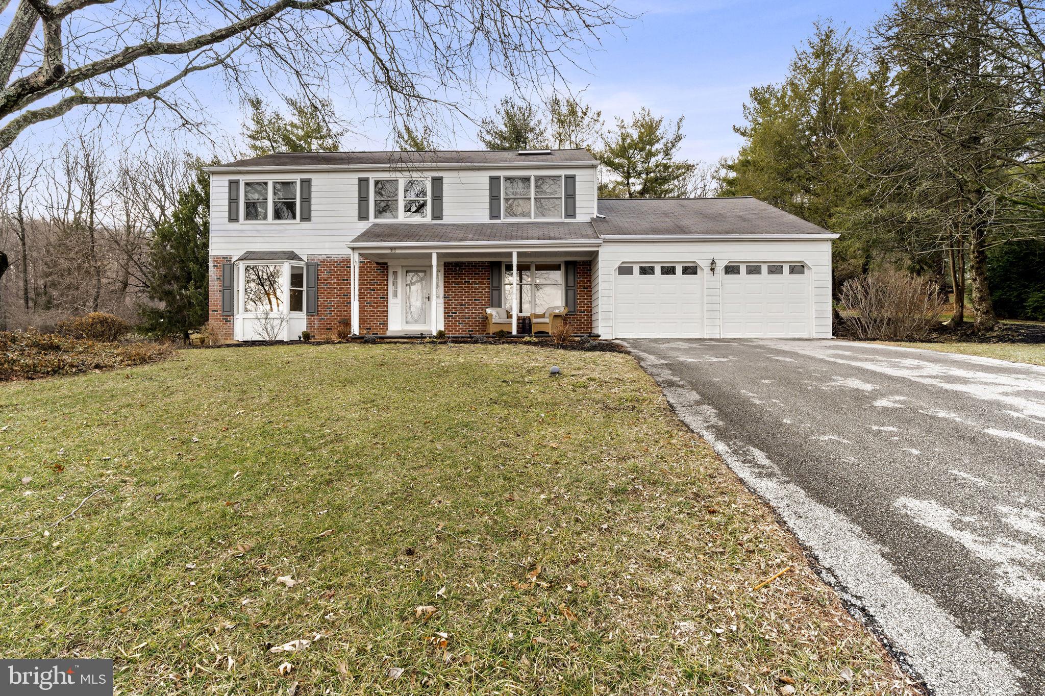 A stunning colonial home nestled in the picturesque Whitford Village of West Whiteland Township. Set on over half an acre of beautifully landscaped grounds, this home offers the perfect blend of classic charm and modern convenience.  A long, covered front porch invites you to relax with your morning coffee or unwind in the evening while taking in the peaceful surroundings. Step inside to a bright and welcoming tile foyer, transitioning seamlessly into rich hardwood flooring that extends throughout the main level. A neutral color palette and abundant natural light create an inviting atmosphere in every room.  Flanking the entryway are a spacious living room with a large bay window and a formal dining room, perfect for hosting gatherings. The dining room flows effortlessly into the newly renovated kitchen, where off-white cabinetry is beautifully complemented by a stylish tile backsplash, granite countertops, and stainless steel appliances. A large island with pendant lighting and seating for two provides the ideal space for casual meals, while the attached breakfast nook is perfect for everyday dining. The sunken family room is a cozy retreat, featuring a brick fireplace to enjoy during the colder months. French-style doors open to a private backyard oasis, complete with an expansive maintenance-free deck, a pergola with planter box footers, and sleek railings. A covered section with string lighting sets the perfect ambiance for outdoor entertaining.  Upstairs, the primary suite is a true sanctuary, featuring a vaulted ceiling and a spa-like ensuite with a glass-framed tile shower, double quartz vanity, marble floors and modern finishes. Three additional generously sized bedrooms, each with ample closet space, share a beautifully updated hall bathroom.   Bonus oversized garage with an extra bay deep for all your tools, mower or sport equipment! Tucked away on a quiet cul-de-sac, this home offers both tranquility and convenience, with easy access to shopping, dining, and major roadways. Don’t miss the opportunity to own this exceptional property in a sought-after community!