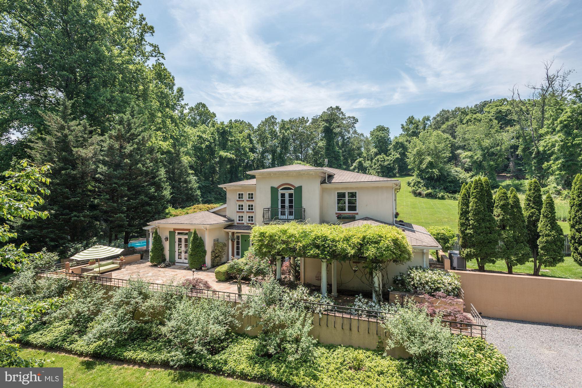 Tuscany under the sun defines this serene retreat on a 5 acre setting down a private gated lane off Bellview Road.  This exceptional estate offers total privacy  with all the amenities for a resort-at-home experience.  Called Sharper's Run, this spectacular property is lushly landscaped with a beautiful entrance courtyard and gorgeous pool area with wisteria covered pergolas and  expansive stone terraces and patios surrounding the entire house, along with eight sets of French doors which allow a seamless flow from inside to outside and is perfect for entertaining.  The lovely screened porch is the perfect place to be to watch the sunset.  The villa style custom home with over 6500 sf of living, features high ceilings, two fireplaces, custom built cabinetry throughout, wide plank hardwood floors and French doors in almost every room including the main level master suite that open to the pool area.  The gracious two story foyer leads to a dramatic two story sun drenched great room.  The Country kitchen  features a large window seat, huge windows with great views of the property and a large butlers pantry and adjoining study/nook.  The cozy sitting room is a perfect spot for reading or watching television.  The upper level has three bedrooms, two with balconies, and two renovated bathrooms.  The lower level has and a rec room, billiards room, au pair suite with full bath and separate outside walk-up entrance, and two storage rooms.  The current owners have made approximately $200,000 in recent improvements including the roof, pool renovation, landscape lighting, updating bathrooms, new entrance gate,  and a new two zoned HVAC system.  Sharpers Run is ideally located central to Dulles and Reagan Airports.  Just minutes from downtown McLean, Tysons and the Village of Great Falls & Reston Town Center, and an easy commute to DC.  For outdoor enjoyment, Great Falls Park and Difficult Run with hiking trails along the Potomac and bike paths at Tysons and Vienna are all just minutes away.  Our national treasure, the Wolf Trap Park for the Performing Arts is just two miles away.    *********Please follow all COVID-19 and CDC precautions.  Practice social distancing, wear mask and gloves, remove shoes, avoid touching surfaces. *******