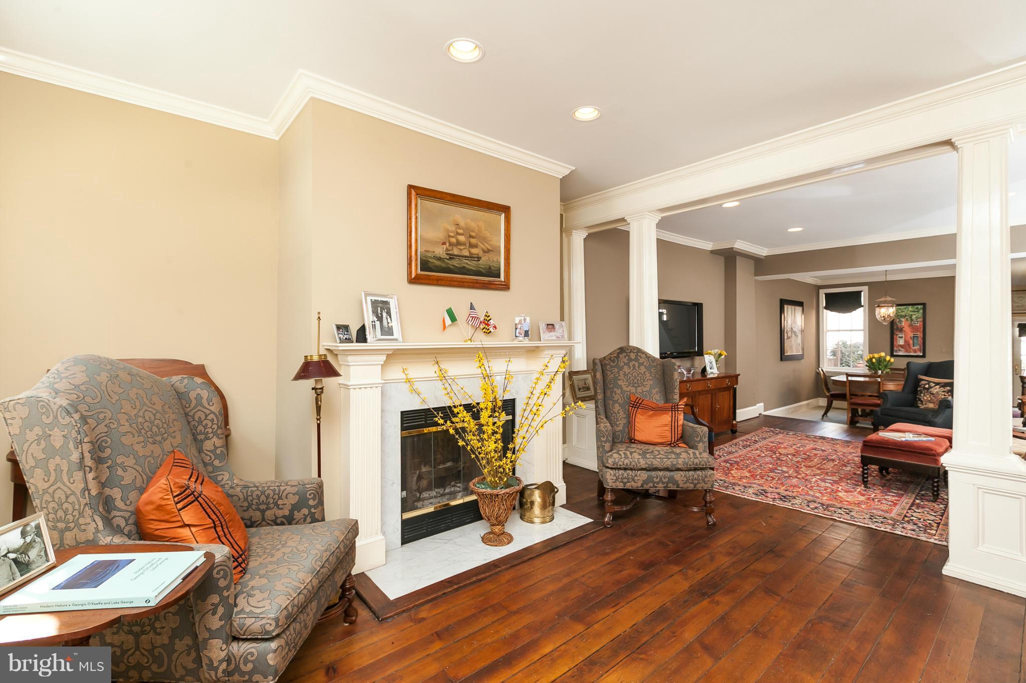 Elegance abounds in this immaculately maintained home in Federal Hill. Three bdrs, 2 full baths, high ceilings, gracious entry, new windows, hardwoods, FR. doors, wood burning  FP, landscaped yard & 2nd level balcony. Exquisitely renovated 3rd lvl. Mst. Ste. w/ fabulous en suite bath. Actual sq. footage 1852,