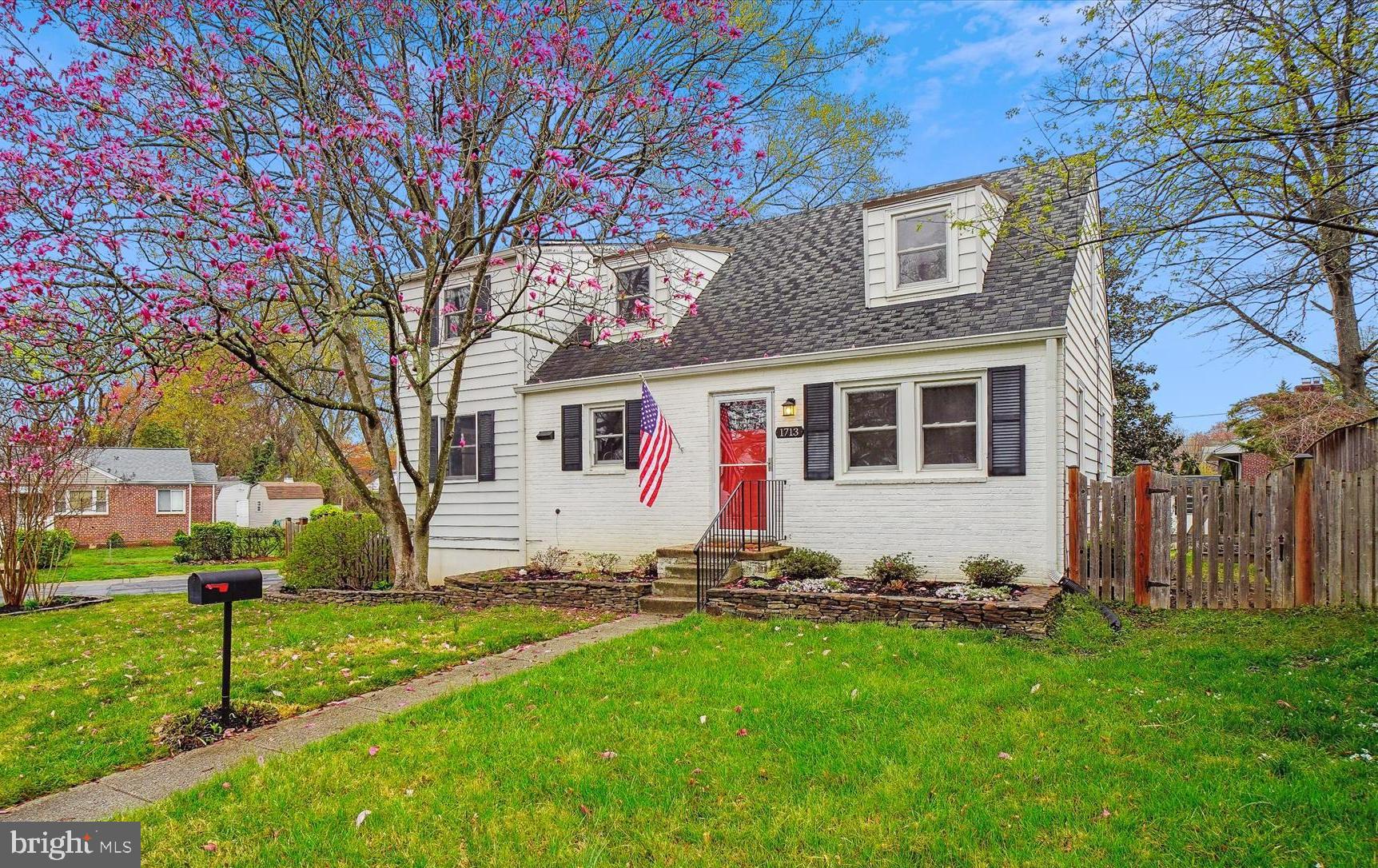 This beautifully updated Cape Cod style home blends timeless character with modern convenience in 
 a wonderful neighborhood. Situated on a spacious, fully fenced corner lot, the property boasts a recently  added driveway and an expansive TREX deck—perfect for outdoor gatherings and entertaining.

Step inside to discover a freshly painted interior and gleaming hardwood floors throughout the living and main level bedrooms. The heart of the home, a stunningly remodeled kitchen, features stainless steel appliances, stylish finishes, and ample space for everyone to cook and enjoy. The addition has been used as the dining room and provides fantastic additional space. The main floor also includes updated closet systems, new windows, upgraded insulation, new interior doors, and an updated full bath —every detail has been thoughtfully refreshed. One of the bedrooms on this level has been used as a home office; the practical built-in shelves convey with the sale.

Upstairs, the expansive primary suite is a true retreat, complete with charming nooks, a fourth bedroom, and an additional full bathroom. The renovated lower level offers a spacious recreation room with new carpeting and new windows, a large laundry area with a high efficiency washer/dryer set, a powder room, and plenty of storage.

Move-in ready and filled with updates, this home offers comfort, space, and style in every corner. For a full list of the recent improvements, please see the list attached!