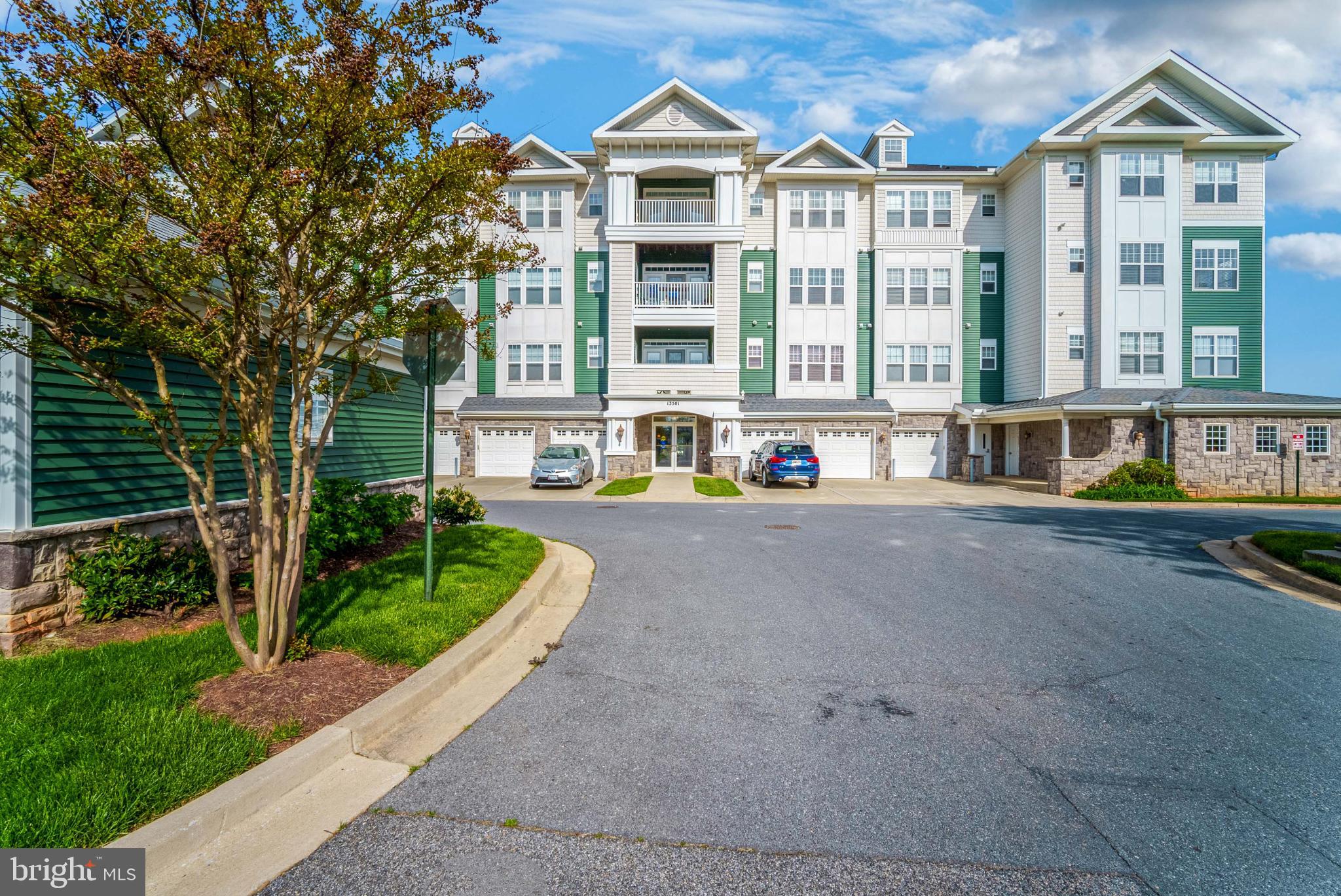 Stunning 2 Bedroom 2 Full Bathroom Condo in a 55 Plus Community. The largest condo in Victoria Falls, offering an impressive 1,919 square feet of living space. This beautifully designed unit has been freshly painted and features new carpet throughout, creating a modern and welcoming atmosphere. Step inside to find a spacious and airy living/dining room combo, perfect for hosting family gatherings and parties. The huge eat-in kitchen is a chef's delight, equipped with ample counter space for preparing meals and enjoying casual dining. Retreat to the serene owners suite, complete with a luxurious walk-in shower with a bench, a soaking tub for relaxation, and a brand new vanity. The suite also boasts a generous walk-in closet, providing plenty of storage. The condo includes a second bedroom and a well-appointed bathroom with a specialty walk-in jetted bathtub, ensuring comfort for you and your guests. Enjoy the outdoors from your private balcony, which features two storage closets and offers beautiful views of the surrounding area. Convenience is key with this unit, as it includes a detached garage for secure parking. Don't miss this opportunity to own a piece of paradise in a vibrant 55 Plus community—perfect for enjoying an active and fulfilling lifestyle! Garage is #18 All Condo buildings have a elevator.  HOA fee covers grounds maintenance, snow removal, clubhouse, walking trails, indoor/outdoor pool, and a lot more!