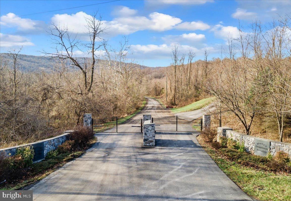 ***PRICE IMPROVEMENT***Discover the perfect canvas for your dream estate with this 10-acre private, wooded sanctuary nestled within an exclusive gated community just minutes from I-66. Tucked away for privacy yet only 5 minutes from the Linden exit, this remarkable property offers the rare opportunity to create a custom retreat surrounded by the beauty of nature.
With approved septic and well permits already on file with Warren County, much of the groundwork has been laid, allowing you to focus on designing a residence that reflects your vision. The gently rolling terrain, dotted with mature trees, creates a scenic backdrop ideal for a grand family estate, weekend getaway, or future investment.
Here, you’ll find yourself at the gateway to Virginia’s most beloved experiences:
Award-winning wineries and breweries just minutes away, including the famous Fox Meadow Winery and Linden Vineyards.
Outdoor adventure at your doorstep with the Shenandoah River for kayaking, fishing, and boating, plus Shenandoah National Park and Skyline Drive for endless hiking and breathtaking vistas.
Convenient proximity to shopping, dining, and local charm in historic Front Royal, just a short drive from the property.
Less than an hour from Northern Virginia and Washington, D.C.—the perfect balance of serenity and accessibility.
Don’t miss your chance to claim this magnificent piece of land in one of the most sought-after regions of Virginia. Whether building a full-time residence or a tranquil retreat, this property is where privacy, beauty, and lifestyle come together.