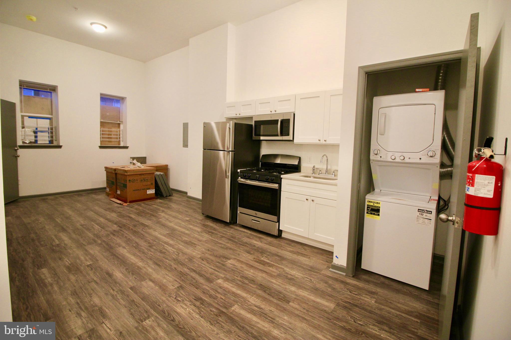 Brand new, never lived located right on Temple Medical Campus!  3rd floor unit is a large 1 bedroom w/ loads of natural light.   All units have brand new kitchens w/ stainless appliances, granite counters + white cabinets. Each unit has new washer/dryer, never used bathrooms, hardwood flooring, high efficiency central ac/heat, high ceilings, new windows, paint + fixtures. Entire building has fire alarms + sprinkler systems.   Too much to list!.  Units are available NOW or no later than May 1st lease inception date.  Easy to show