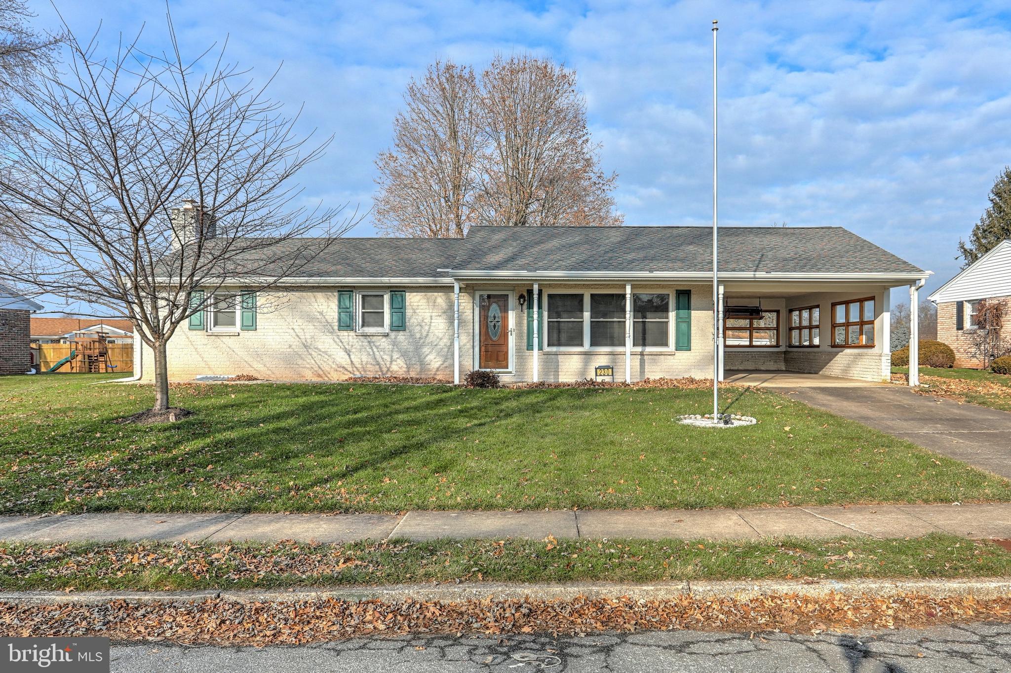 Brick rancher with car port - level yard with small patio and shed, Freshly painted  thru out, Large LR with new carpet,  Kitchen with new ceramic backsplash, new flooring, dining area, ceiling fans in every room,  large 3 season room, Family room with new carpet in basement, den with Wood Burning FP - Newer roof, replacement windows, water proofing system in basement, Met Ed  easy green program.