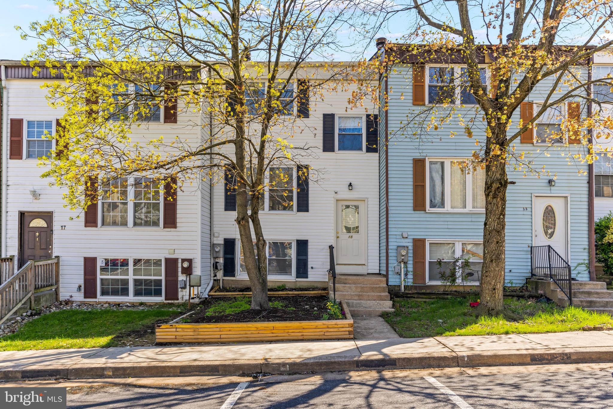 Welcome to 15 BOHN CT nestled in a quiet townhome community in Rosedale! A beautifully maintained 3 Bed 1.5 bath home with fresh paint throughout. The main level boasts a spacious open living room, and eat-in kitchen with plenty of cabinet space, electric stove & dishwasher. Upstairs you’ll find 3 comfortable and bright bedrooms, a spacious full bath and plenty of storage with 2 hall closets! The walk-out basement level boasts a separate laundry & storage room and an additional room that could serve as 4th bedroom, office or workout space. As well as a second spacious living space with brick fireplace &  sliding glass door leading to rear deck & fenced-in back yard. Convenient to major highways for commuters and local dining and shopping. Schedule your showing today!