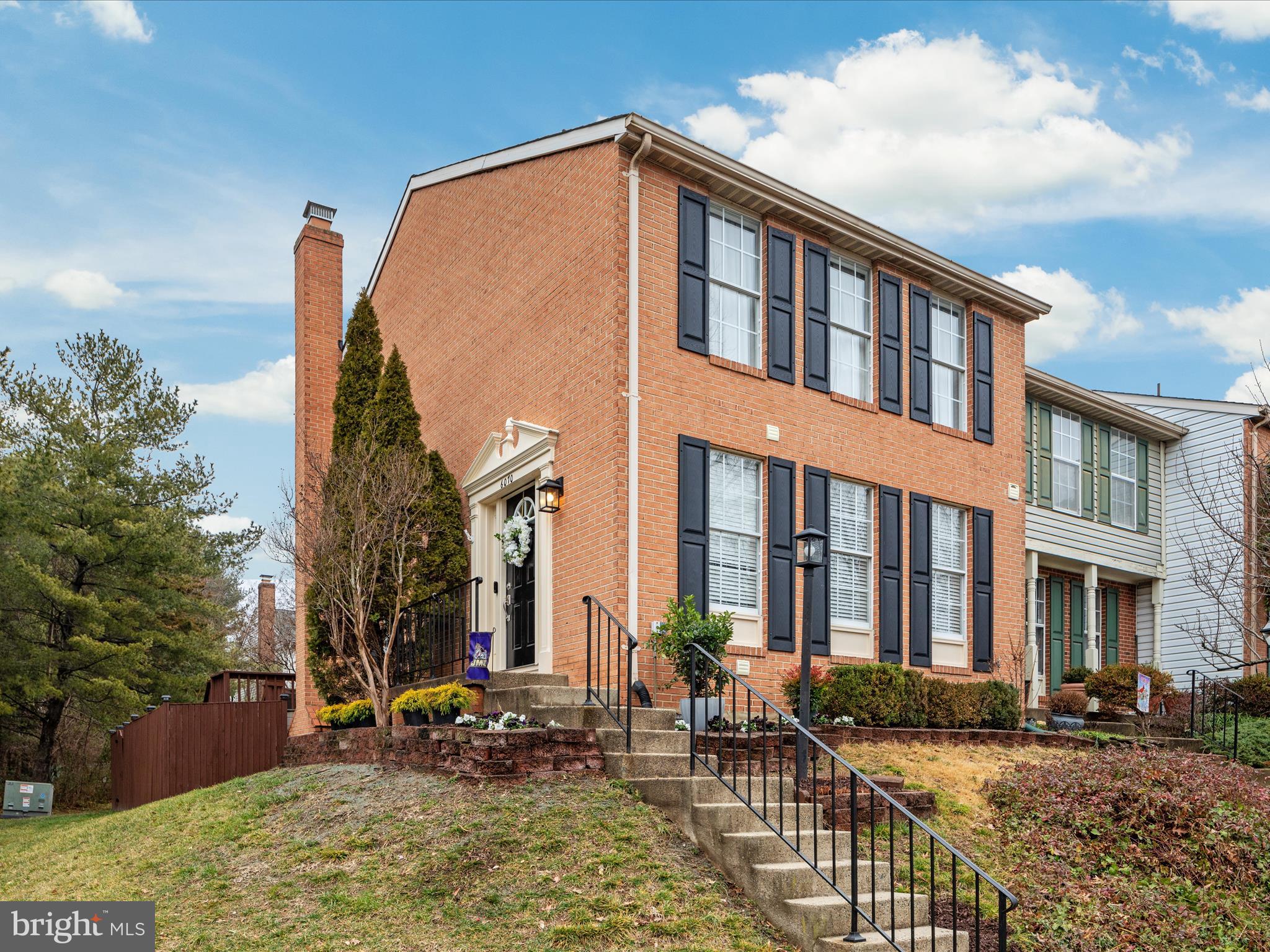 Indulge in the charm of this captivating end unit home in Alexandria, VA!   With over 2,000 square feet there's plenty of room to spread out and live your best life.    Stunning end unit shows like new, 3 bedroom, 3.5 baths on 3 gorgeous levels, hardwood floors on entire main level, new carpet on upstairs level, new upgraded engineered wood floors on lower level, walk up basement, tons of storage, closet organizers, fresh paint throughout.  Floor plan is open, spacious and airy. Big, bright updated kitchen looks like something on your Pinterest board, brand new quartz countertops, white cabinets, subway tile backsplash, gas range, a pantry, and tons of natural light. The living room/dining room combo is open and roomy, making the transition for cocktails and conversation to dinner a breeze (don't forget the bonus pass-through to make serving that much easier). 3 bedrooms on the upper level,  large primary bedroom complete with an en-suite! Then there's... the basement of your dreams. Custom built-ins and a wood burning fireplace with a gorgeous mantel, large rec room, plenty of space for an office or 4th bedroom, a full bathroom, large storage/laundry room!   Walk out to the fully fenced back yard with plenty of green space to play catch or fetch, and if you're into hosting you can move your dinner parties out to the back deck this spring. This is a MUST see, will go fast.  Pride of ownership on full display.  If you're thinking this house is amazing, wait until you check the location! Easy access to all Manchester Lakes amenities, Pools, tennis courts, playgrounds, fitness center, 8 miles of paved walking trails, walkable to shops and restaurants, 5 minutes to the Franconia-Springfield Metro, 8 minutes to the Van Dorn Metro, 8.7 miles to Old Town Alexandria, 16 miles to Washington DC, 14 miles to Reagan National Airport, and of course easy access to I-95, I-395, and I-495.