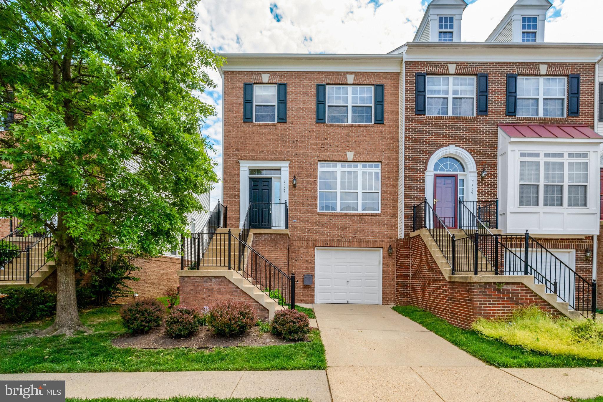 Impressive end-unit townhouse showcasing significant recent upgrades including a newer tankless water heater(never run out of hot water), newer Carrier HVAC units, a newer roof, and brand new carpet throughout! This elegant home features a distinctive brick front, 3-level bump-out, and a 1-car garage. Inside, discover hardwood floors on the main level and a welcoming family room with a cozy fireplace adjacent to a huge, upgraded kitchen. Culinary enthusiasts will love the stylish matte white GE Café range, Bosch dishwasher, and vent-out range hood. A bright breakfast nook with deck access is ideal for entertaining. Retreat to the oversized primary bedroom with a vaulted ceiling, walk-in closet, sitting area, and luxurious en-suite bathroom. The spacious, open walk-out basement leads to a fully fenced yard. Enjoy the convenience of a 1-car garage with workspace and storage, plus extra driveway and common area parking. Commuters will appreciate the quick 5-minute drive to the Metro and easy access to all major routes. Enjoy being adjacent to a large park and close to Springfield Town Center, shopping, and dining, with the VRE, 495, 395, and Fairfax County Parkway just minutes away.