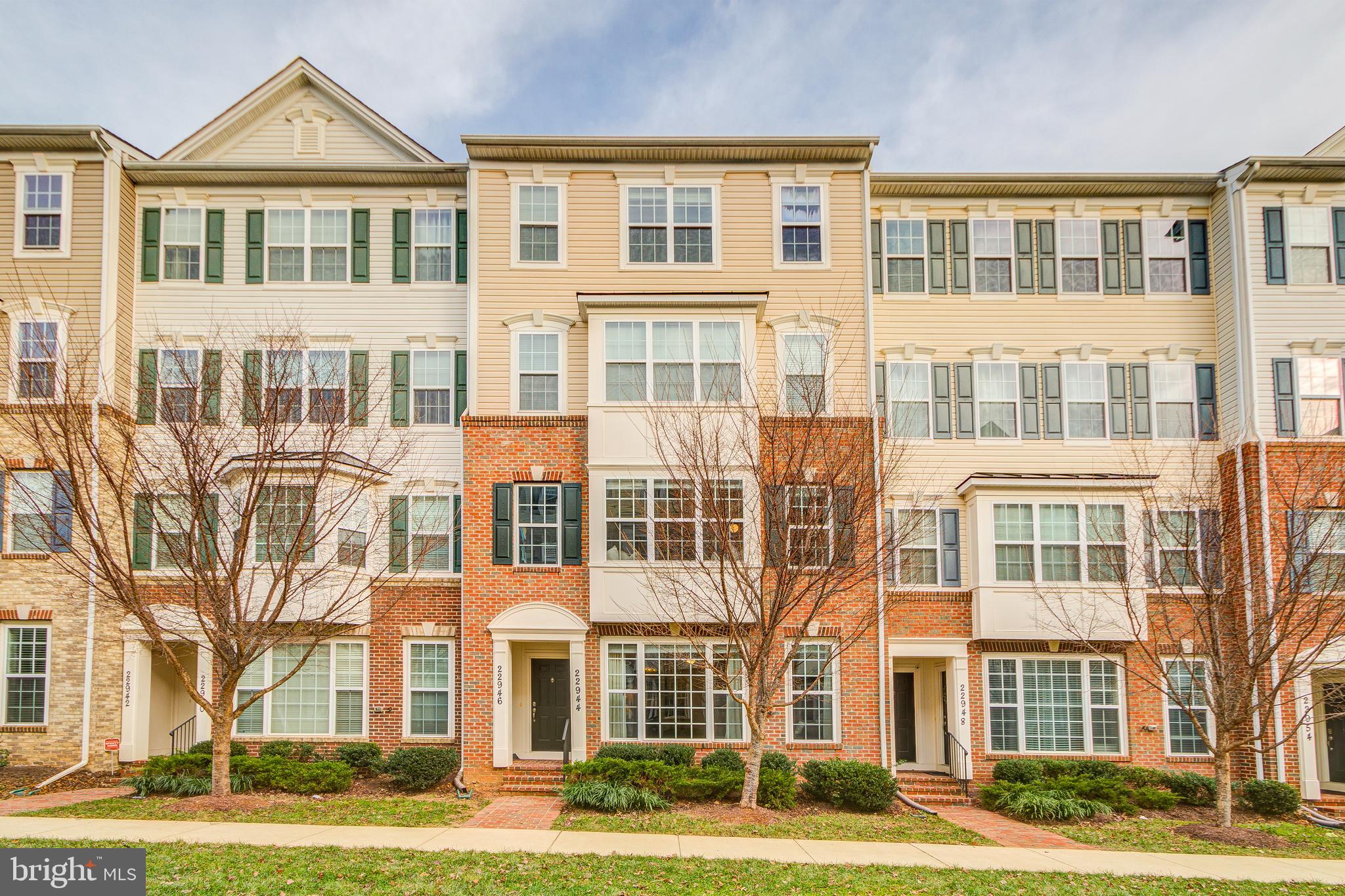 This stunning home is situated in the desirable Arora Hills Community in Clarksburg. Within walking distance to shopping, restaurants, and community parks. The property features over 1,700 square feet of living space with 2 Bedrooms and 2.5 Bathrooms including a garage. The unit features hardwood flooring throughout. Enjoy the open concept main level with a large living/dining room combination. The living room has a large picture window letting in tons of natural light and beautiful views of the community courtyard. The kitchen features stainless steel appliances, granite counters, and plenty of storage space. You have direct access to your garage from the kitchen. There is also a convenient main floor powder room. The upper level features a spacious master bedroom with a walk-in closet and ensuite featuring oversized vanity, soaking tub and walk-in tile shower. You also have  large upper level laundry room and another full bath and bedroom.  As a bonus you have an additional family room that can be multifunctional with direct access to your back deck. This property is located within minutes to I-270 and public transit. Don't forget to view the virtual tour of this home!