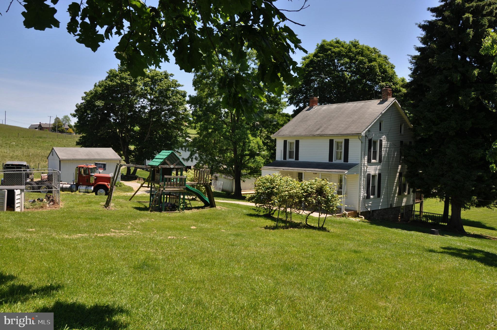 This is a must see. With the 20 +/- acres fully fenced you can have the animals you have always wanted or even that garden you have dreamed about. The 25x50 bank barn has a solid floor with lots of room for hay storage and large stalls below.  Four bedroom, turn of the century home offers you a beautiful stone foundation outside complemented by the original hardwood floors and plaster walls inside.  5051 Tannery Road has had many updates over the years with newer appliances, water system and double hung replacement windows.  Enjoy the open floor plan of the living room and dining room with a warming pellet stove.  The kitchen gives you lots of storage with ample counter space to prepare that farm to table, home cooked meal.  Take a break and sit and relax on the covered porch to enjoy your morning coffee or a piece of fresh fruit picked from the orchard on the property.    Contact me for your private tour of this enjoyable homestead. Also available is 4857 WOLFGANG RD GLENVILLE, PA 17329   Residential - MLS#  PAYK133058 buy them both and have 70 acres