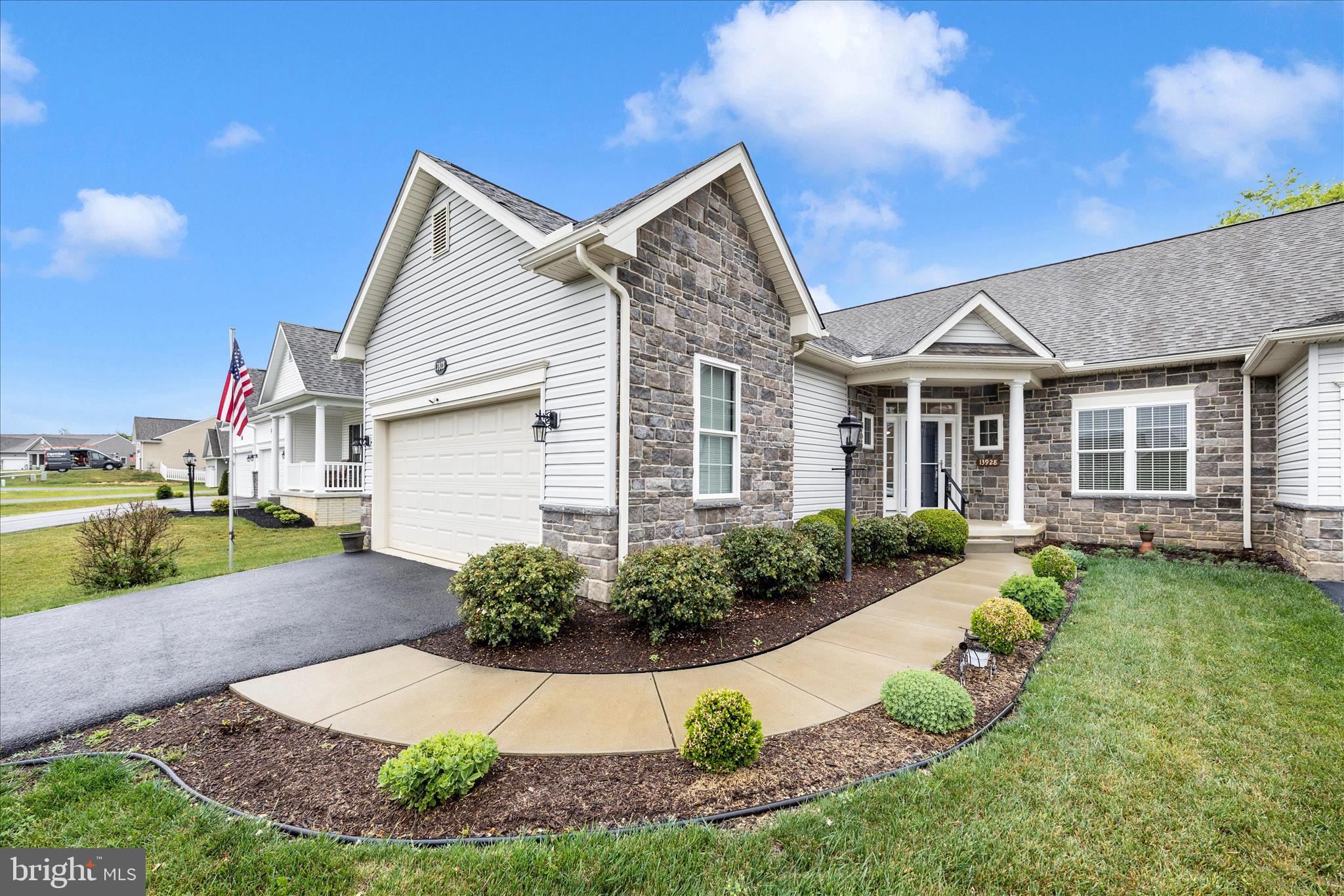 Beautifully maintained 2 bedroom, 2 full bath ranch villa located in a desirable 55+ active community and built by Admar Homes. This inviting home offers an open floor plan featuring a spacious living and dining area accented by a stunning gas fireplace and abundant windows that fill the home with natural light.

The kitchen is thoughtfully designed with granite countertops, stainless steel appliances, a pantry, breakfast bar, and space for a kitchen table, creating both functionality and comfort. Just off the kitchen, the convenient laundry room leads to the oversized 2 car garage offering excellent storage space.

The spacious primary suite features a walk in closet and an accessible private bath complete with dual sinks, grab bars, and a walk in shower. The secondary bedroom also includes a walk-in closet, while an additional full bath and multiple storage closets are privately situated within their own hallway area.

The full unfinished basement offers endless possibilities for future expansion and includes rough in plumbing for a future full bath. Additional highlights include beautiful wood flooring, ceiling fans, and window blinds throughout.

Step outside to enjoy the beautiful covered patio accented with elegant pillars and outdoor shades for added comfort and privacy, creating the perfect space for relaxing or entertaining. The patio also includes wiring for a future hot tub and opens to a professionally landscaped rear yard surrounded by a privacy fence for additional seclusion, along with a storage shed providing extra outdoor storage space.

Best of all, no HOA and no city taxes, while still being conveniently located near interstates, shopping, and restaurants.