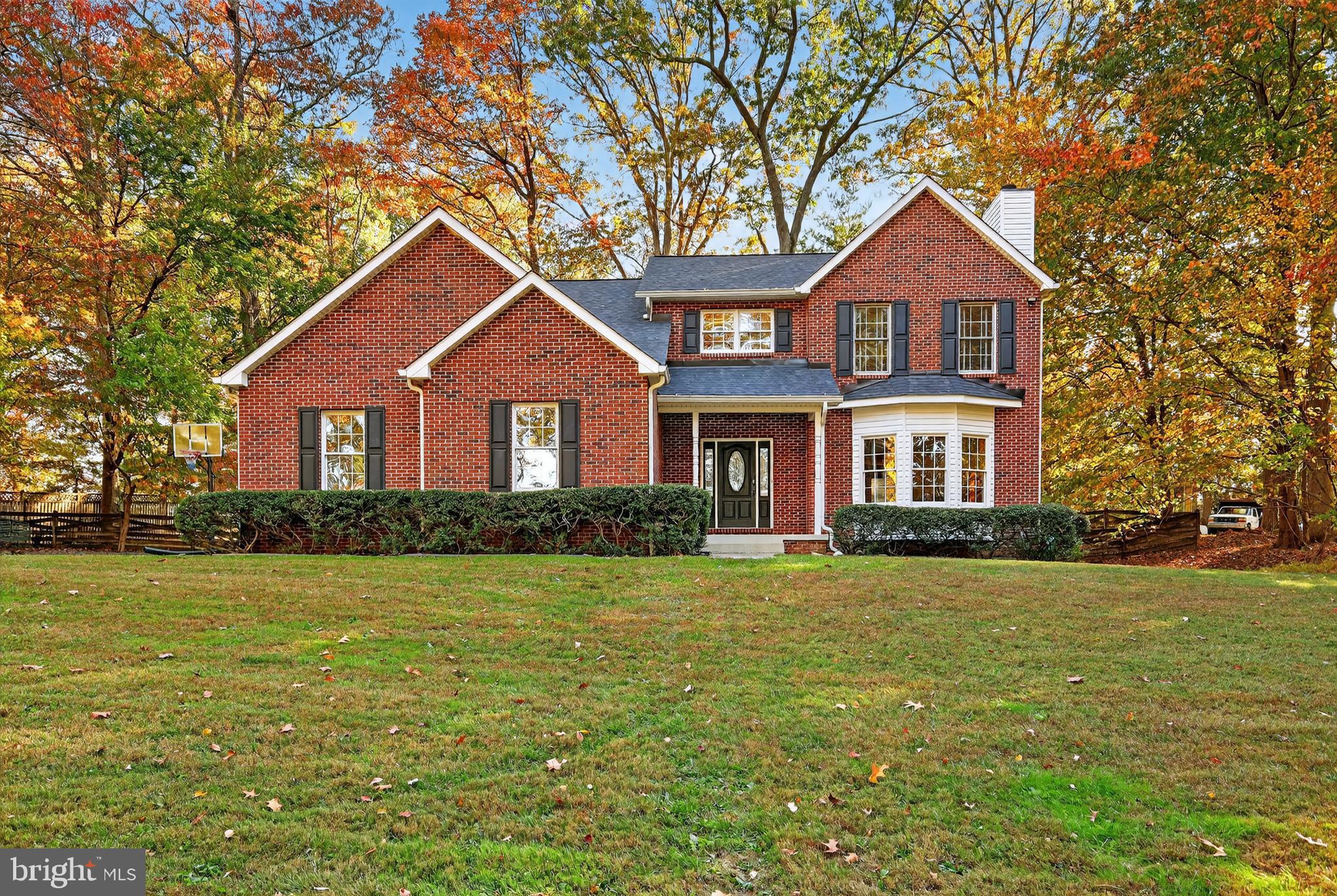 Welcome to Rocky Road View! Meticulously maintained custom brick-front Colonial on 1.09 private acres in Montgomery County’s Agricultural Reserve—no HOA! Parking for 10+ cars - room for RV / boat, etc.  Enjoy  4,000 SF with refinished hardwoods, coffered ceilings, sunlit living areas, and a gourmet kitchen with granite counters, maple cabinets & stainless appliances. Luxurious primary suite with spa bath, plus 3 spacious bedrooms & renovated hall bath. Finished lower level with gym flooring, media area & full bath. Energy-efficient 2x6 construction, dual-zone HVAC, pellet stove, & whole-house fan—avg. electric only $230/mo! Outdoor oasis with flagstone patio, fenced yard, shed w/power & mature trees. Oversized 2-car garage, new roof (2025). Minutes to I-270, Metro, top schools, shopping & dining.