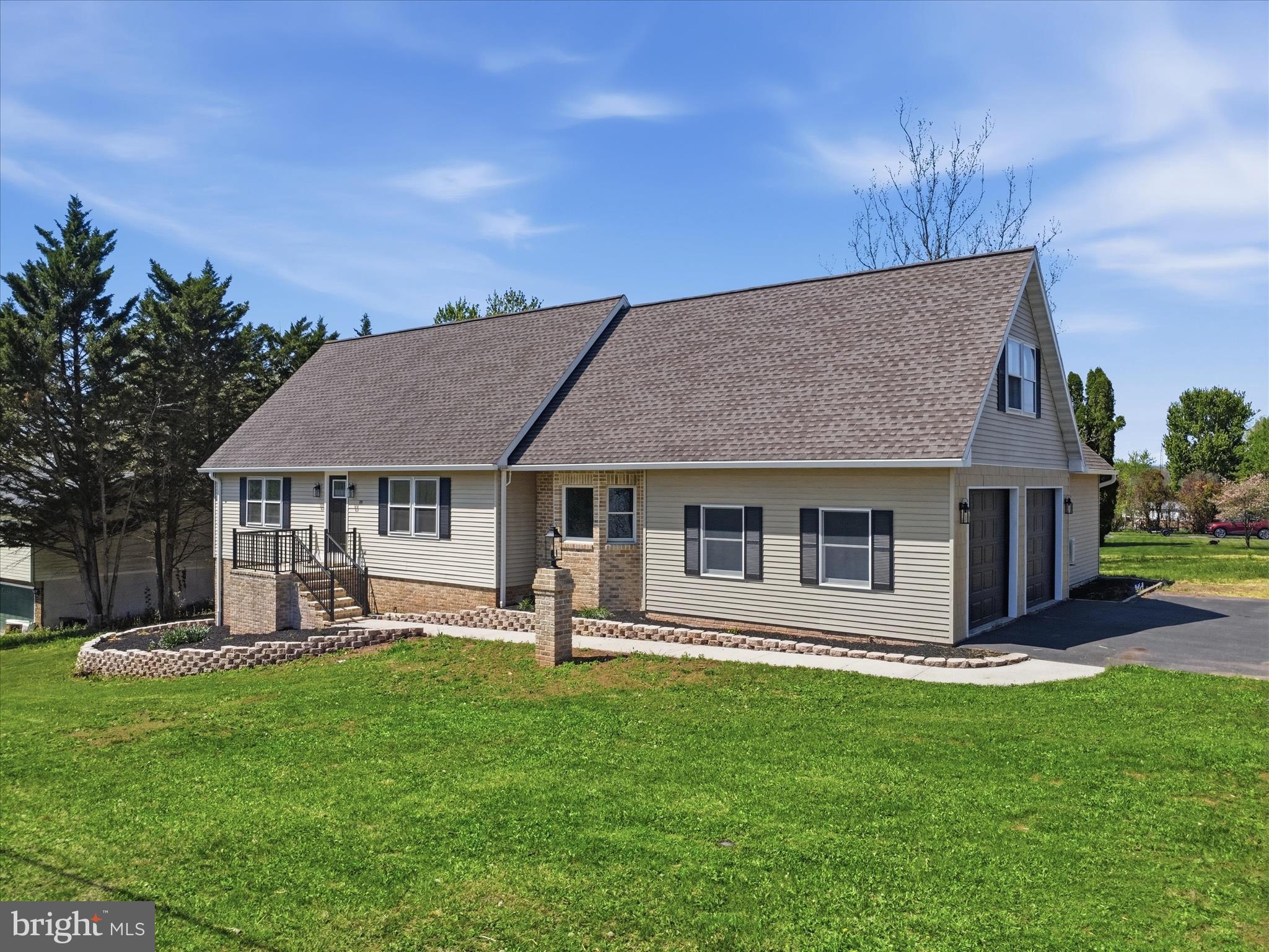 Completely remodeled from top to bottom, this spacious and versatile home offers 4-5 bedrooms, 3.5 bathrooms, and room for everyone and everything! The main level features generously sized living and dining areas, highlighted by a charming coffee bar, along with a beautiful kitchen complete with an island, granite countertops, and a warm, cohesive backsplash. Two spacious bedrooms and a full bath are conveniently located on the main level. Just off the kitchen, a functional mudroom with washer and dryer provides access to the outdoor living space, including a two-tiered deck and an oversized 3-bay garage with walk up storage above.

Upstairs, the brand-new primary suite is a true showstopper, offering a stunning walk-in shower and an expansive walk-in closet. A dedicated office space with built-in desk, shelving, and storage provides the perfect work-from-home setup. The upper level is completed by a large great room that offers endless possibilities - ideal as a fourth bedroom, game room, media space, or library. But don’t miss the lower level! The basement adds even more living space with a finished family room, potential fifth bedroom, and a convenient half bath. Lower level also features it's very own outside entrance!

Ideally located less than 10 minutes from downtown Gettysburg, shopping outlets, and historic attractions, this home offers both space and convenience in a highly desirable setting. The views of the neighborhood pasture are so peaceful! This home is a must see to appreciate! So much time and effort has been put into it to make it what it is today! Now, all that's missing is you! We could talk about this one forever but come see for yourself. Offering a FIRST LOOK OPEN HOUSE Sunday, 4/26 1-3PM! Join us and bring a friend!