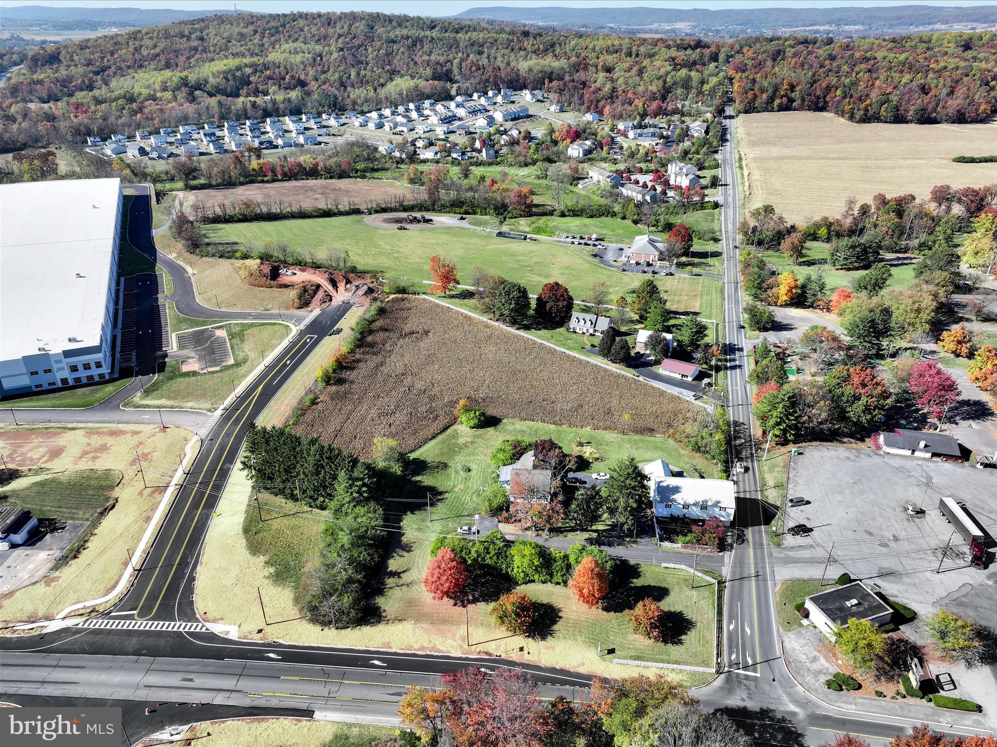 The New Hill Road is partially complete... and the Rte. 272 corners are curbed, paved and seeded... with even more decisions that will need to be made.
Corner Lot - Updated on lot lines & Road Frontage on North Reading Road just off the PA Turnpike Entrance in Denver is a 5.4-acre redevelopment opportunity.  It Is General Commercial C-1 zoned, allowing a mixed set of uses including retail formats. Conveniently located along North Reading Road (16,000+ VPD), the site provides quick access to and from I-76 (29,000+ VPD).  An estimated 9.92 million visitors to Lancaster County directly spent $2.58 billion in 2023 (representing gains of 1.5% and 4.3% over 2022), creating a total tourism impact of $3.4 billion in the county. This site a great development opportunity for any retailer to enter the Northern Lancaster County market.