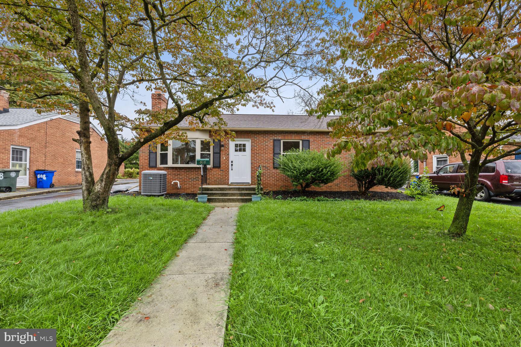 Enjoy a peaceful lifestyle just moments from Hood College. This bright and inviting home is filled with natural light and enhanced by newly installed recessed lighting throughout. The interior feels open and welcoming, featuring beautifully refinished hardwood floors and fresh paint. The kitchen offers a sleek, modern touch with quartz countertops, abundant 36-inch cabinetry, and brand-new appliances.
Perfect for hosting, the expansive sunroom provides a comfortable and stylish space, complete with a wet bar ideal for entertaining and making lasting memories. Designed for year-round comfort, it also features electric baseboard heating and a mini-split AC system. Step outside to a newly built patio overlooking a fully fenced yard, offering both privacy and a serene outdoor setting.
The lower level has been thoughtfully updated with a fully finished basement that includes two spacious bedrooms and a contemporary tiled full bathroom. This beautifully updated home is ready to welcome its next owner—don’t miss the opportunity to make it yours.