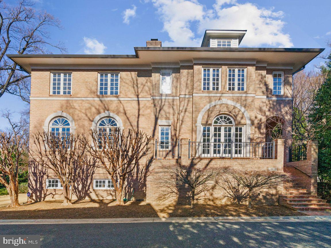 Nestled within the distinguished enclave of Battery Kemble Place, former New York Governor and Vice President of the United States, Nelson Rockefeller’s estate, this inviting home seamlessly combines classic style with modern comfort. 
 
The formal living room offers high ceilings, sun-drenching windows, wood-burning fireplace and south-facing balcony. The sizable formal dining room with built-in cabinetry leads you to the kitchen via a delightful breakfast nook. A large chef’s kitchen offers Brookhaven cabinetry, high-end appliances, granite counters, and  large peninsula with seating. The kitchen overlooks a spacious family room, with two-sets of French doors that open to the patio and backyard. In addition, an elegant library features a gas fireplace, custom built-ins, and French doors opening to the garden. 
 
On the upper level, an impressive primary bedroom awaits, complete with en-suite bath featuring dual vanities, shower, and jacuzzi. There is also a coffee bar, wood burning fireplace, and dual walk-in closets. Three additional spacious bedrooms are on the second floor, two of which feature en-suite baths, and one has its own hall bath. Don’t forget to look up and view the sky through the large skylights that brighten the hallway and staircase.

The lower level is a versatile space, featuring a private guest bedroom with full bath, spacious recreation room, large laundry room, and ample storage. There is also access to the oversized two-car garage on this floor. 

A meticulously landscaped garden, complete with private patio and putting green provide an entertaining outdoor space. Architectural details abound, from custom crown molding to beautiful arched windows, lofty high ceilings and pristine hardwood floors. The home’s distinctive character is complemented by the surrounding Battery Kemble Place, an address embracing a sense of community while maintaining a discreet allure.